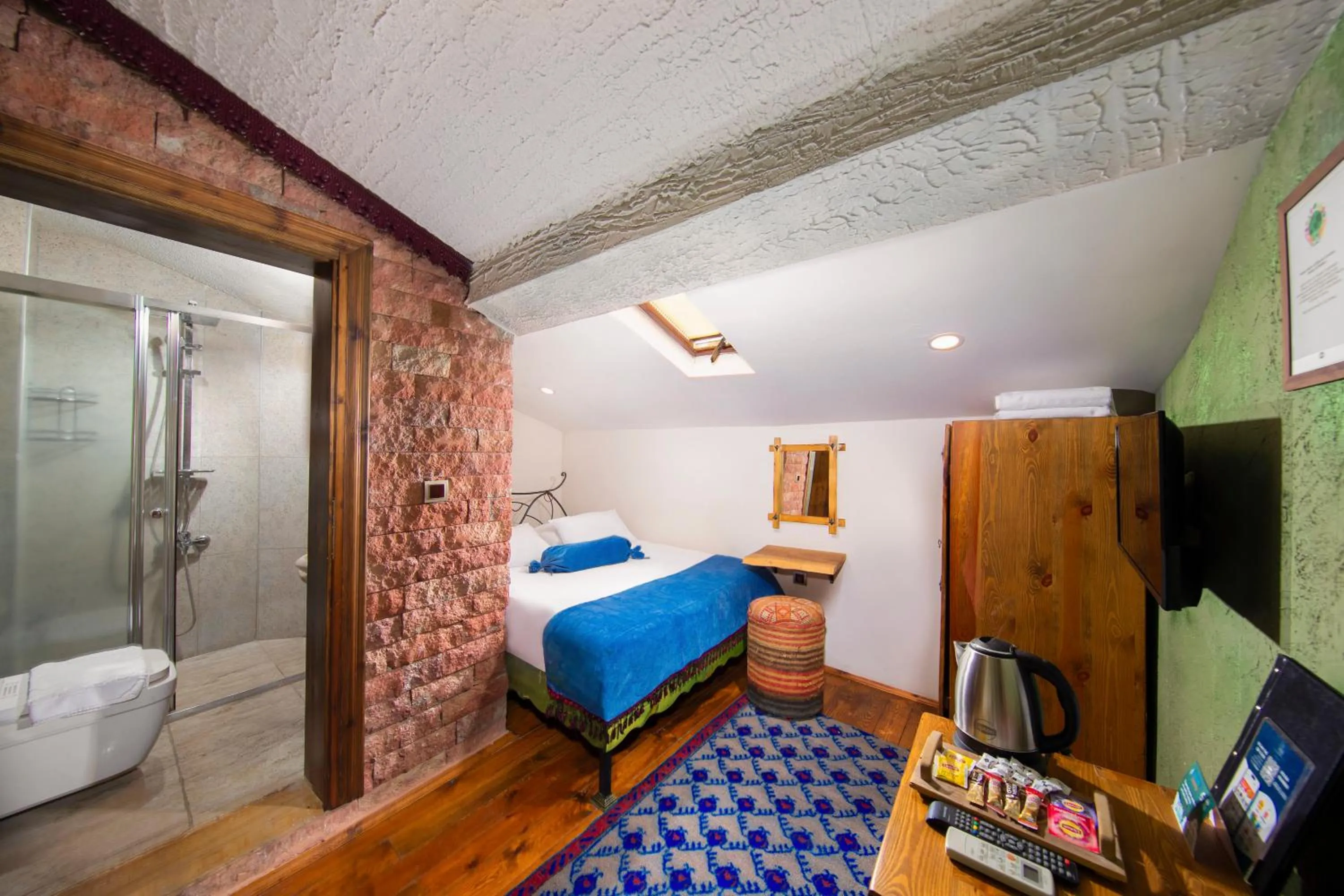 Photo of the whole room, Bed in Aja Cappadocia Cave Hotel