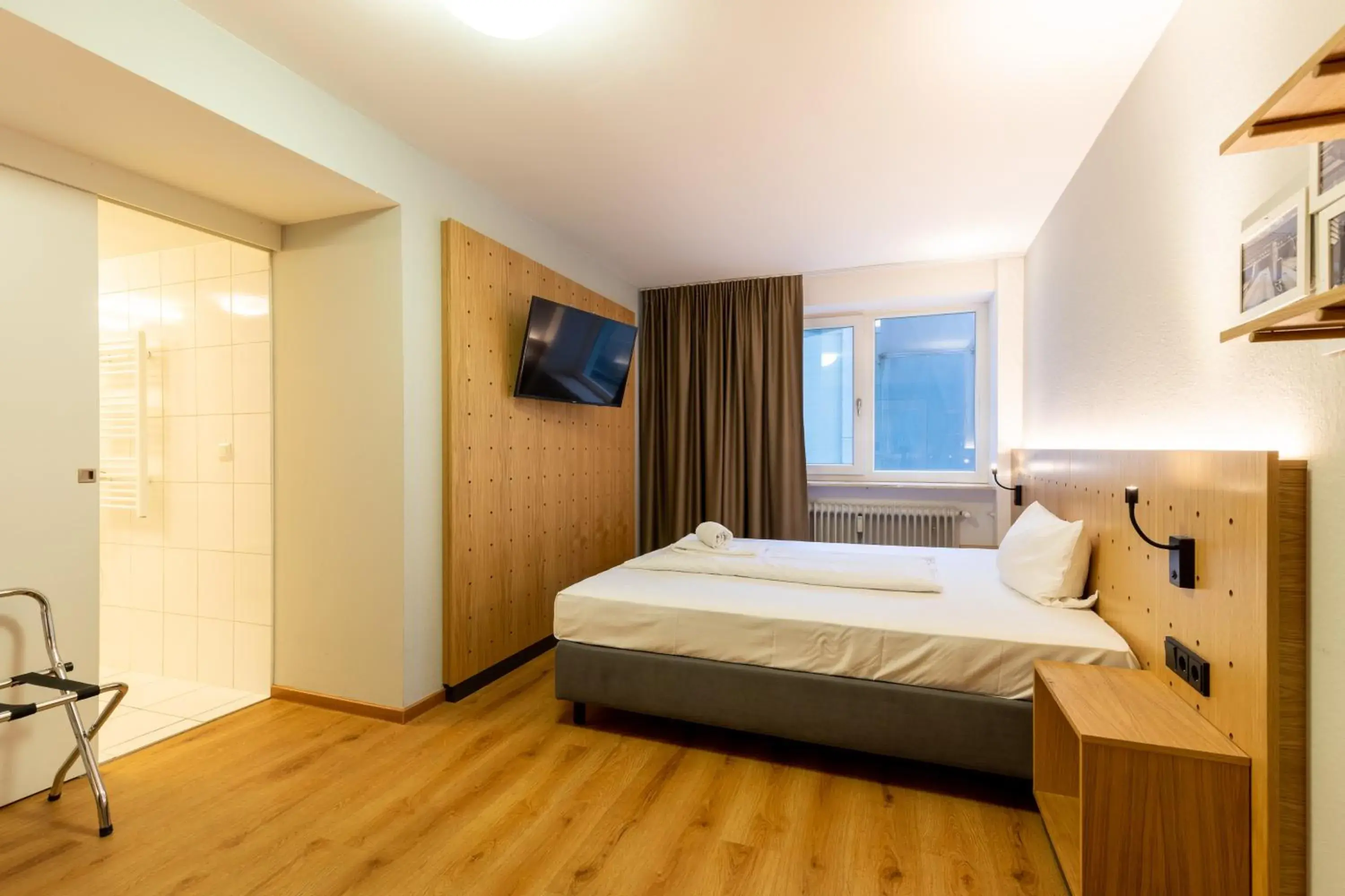 Photo of the whole room, Bed in mk hotel frankfurt Photo of the whole room, Bed in mk hotel frankfurt