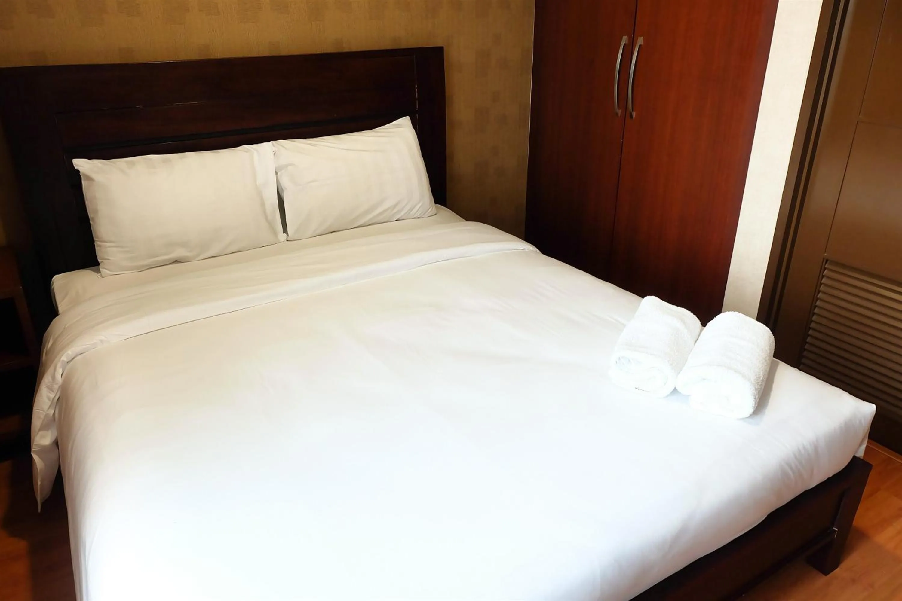 2BR Prestige Essence Dharmawangsa Apartment By Travelio