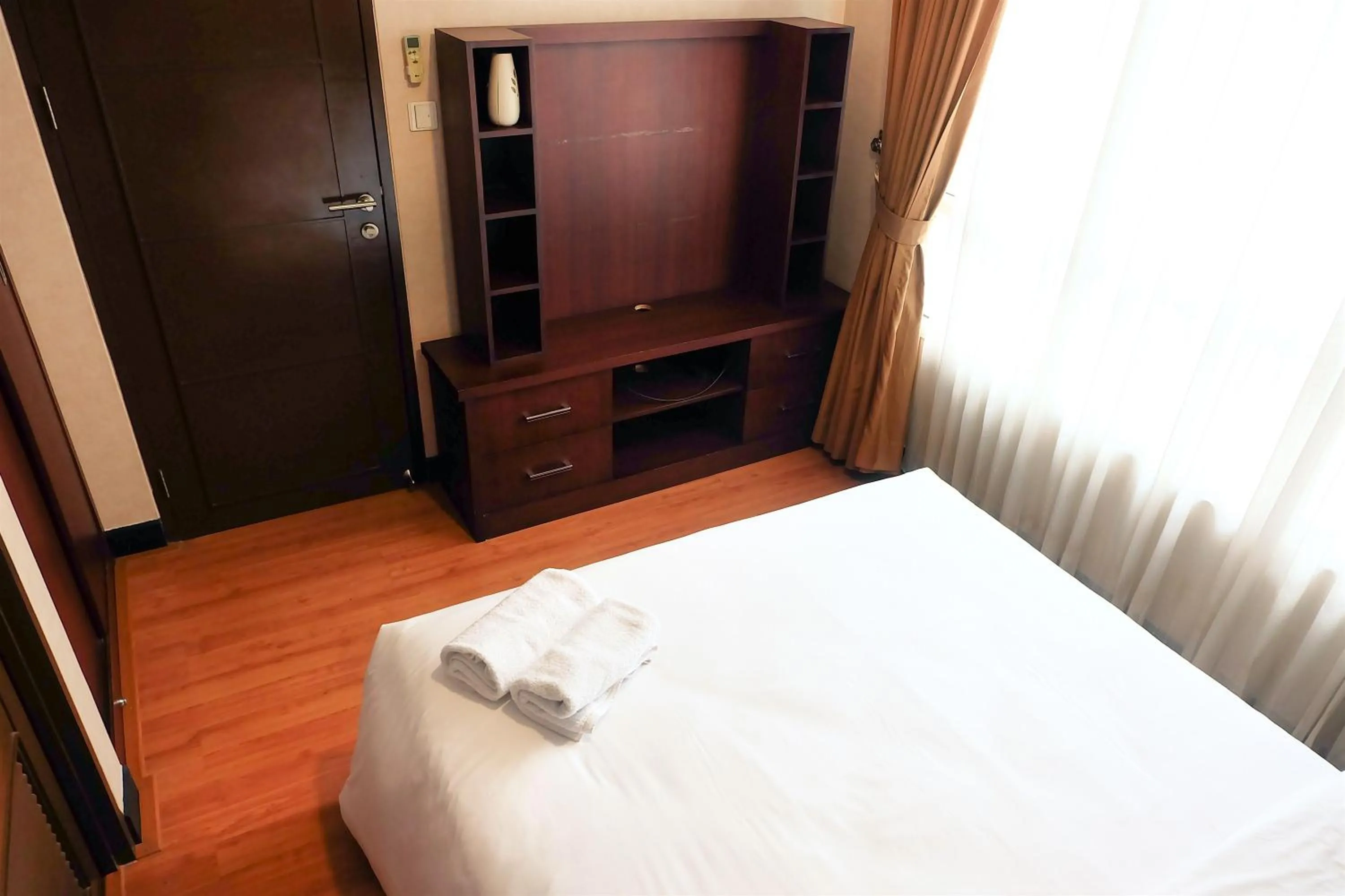 2BR Prestige Essence Dharmawangsa Apartment By Travelio