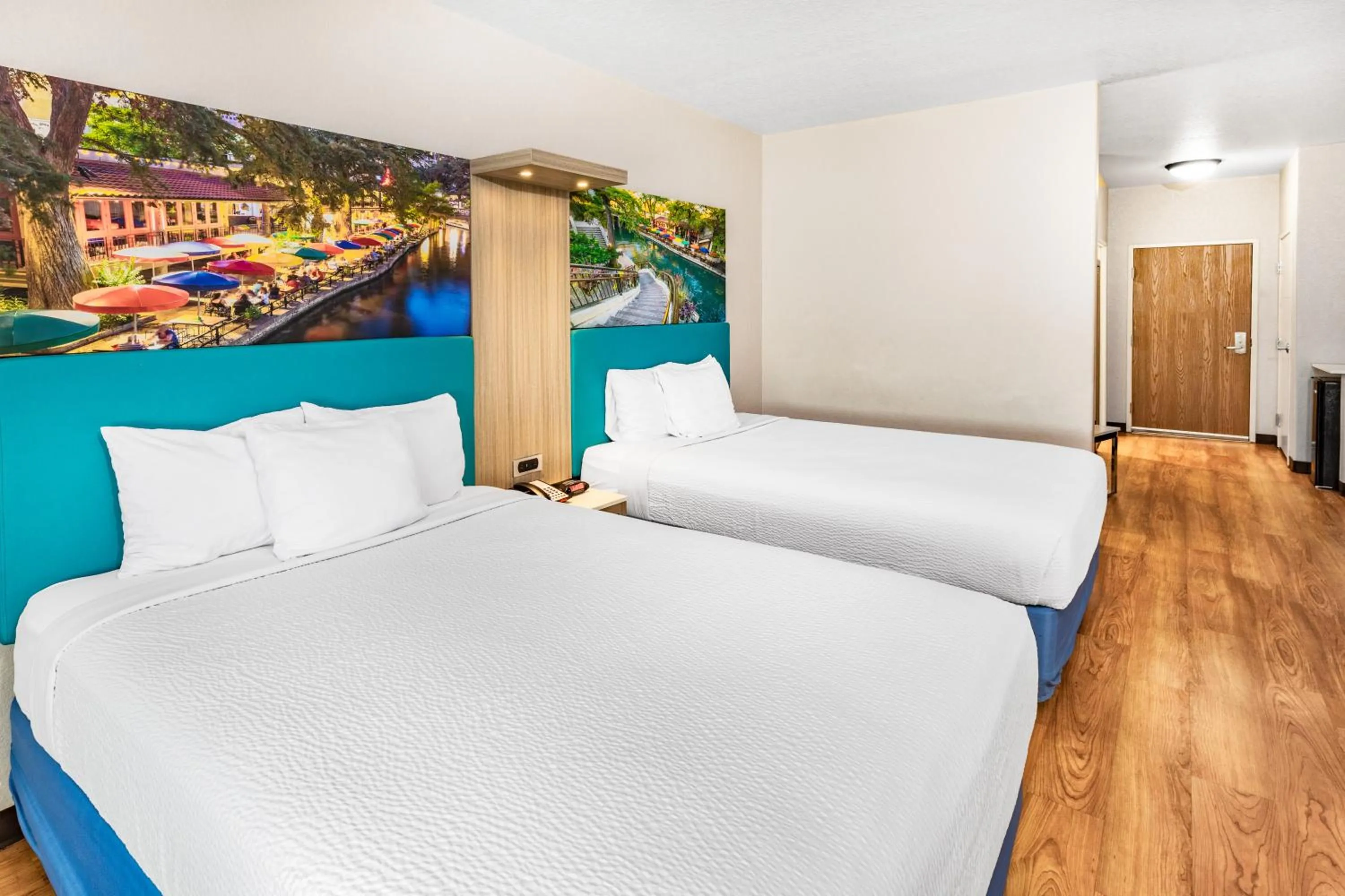 Bed in Days Inn & Suites by Wyndham San Antonio near Frost Bank Center