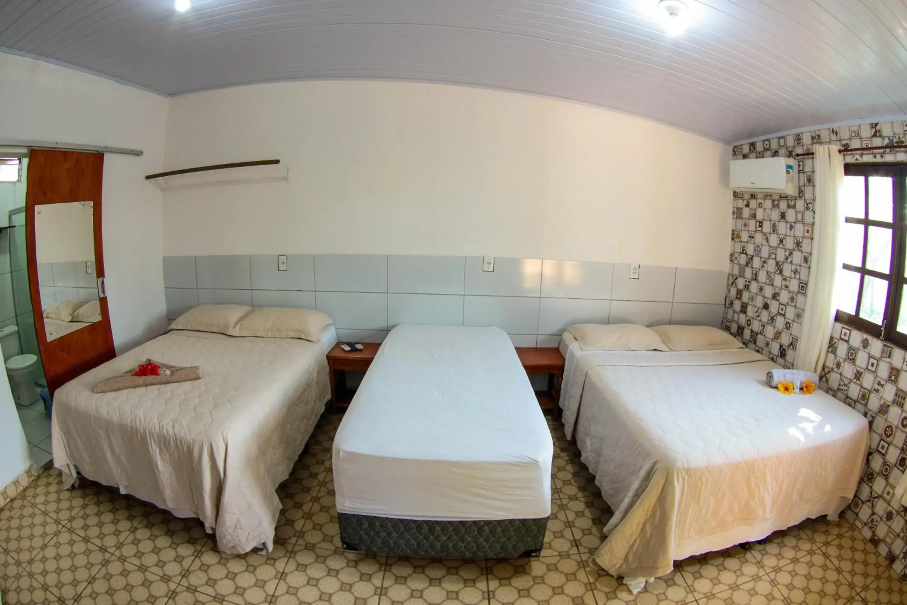 Triple Room in Pousada Leão Marinho Triple Room in Pousada Leão Marinho