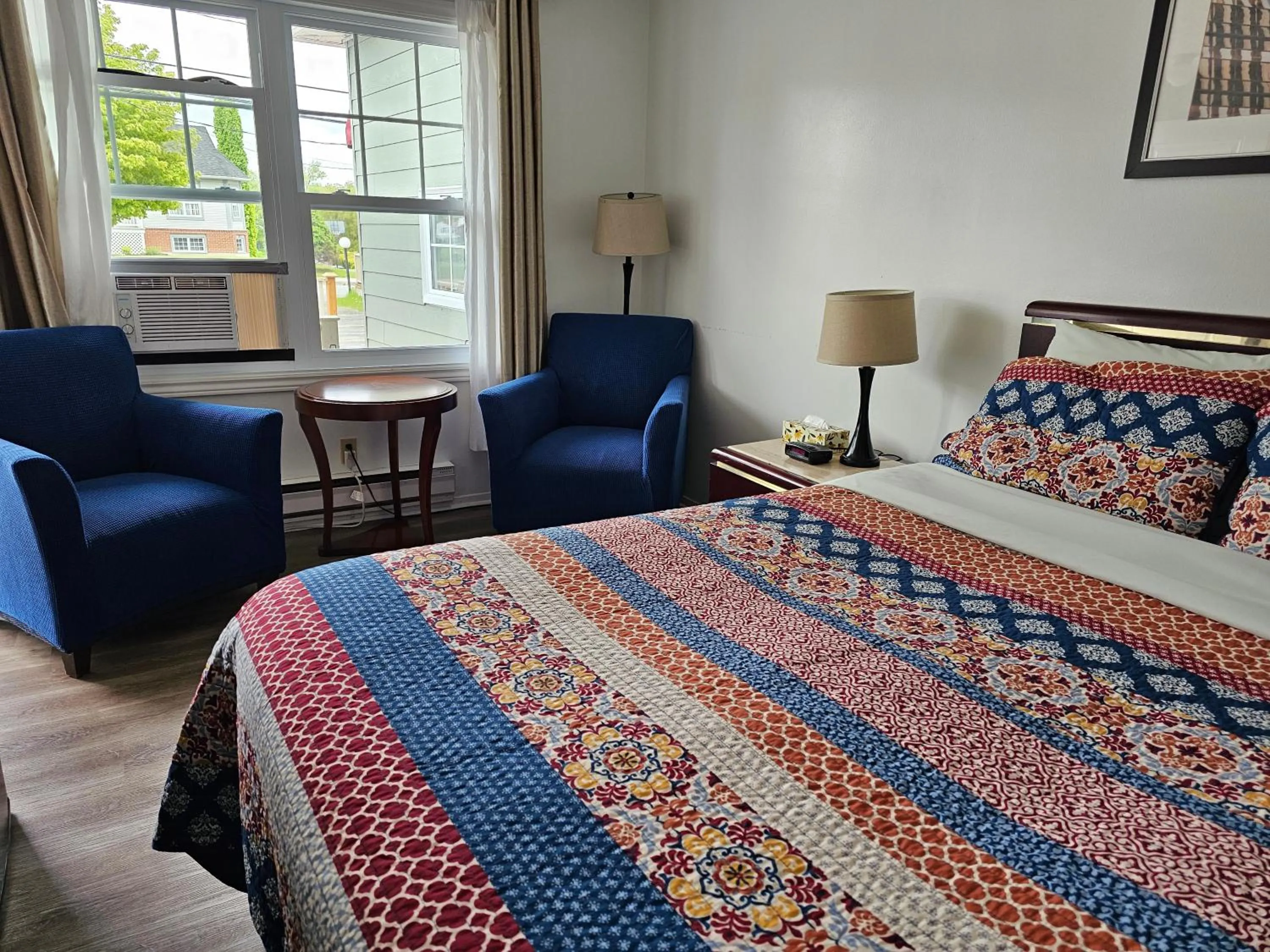 Bed in Motel de l'Outlet