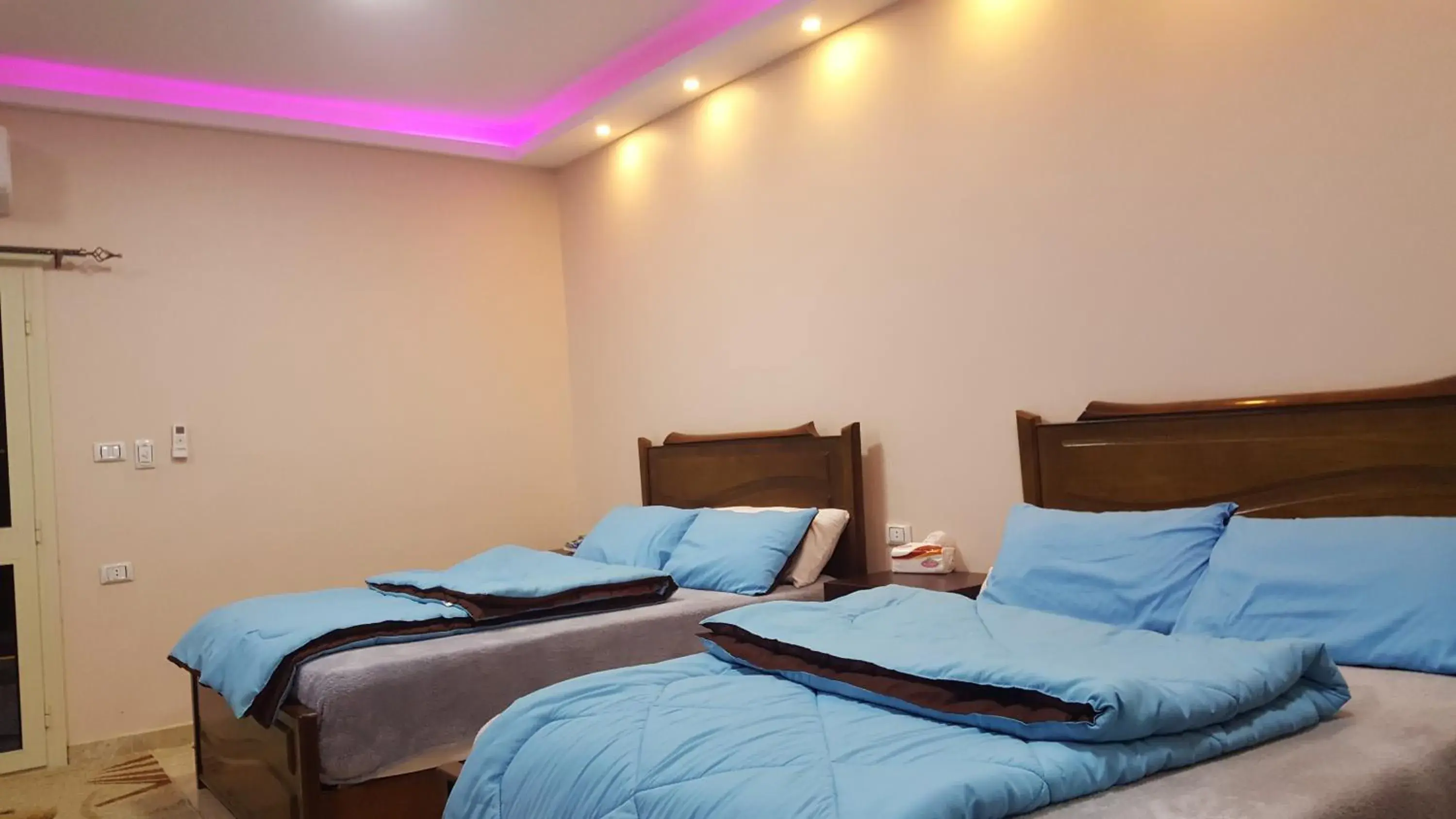 Bed in Royal Pyramids Inn Bed in Royal Pyramids Inn