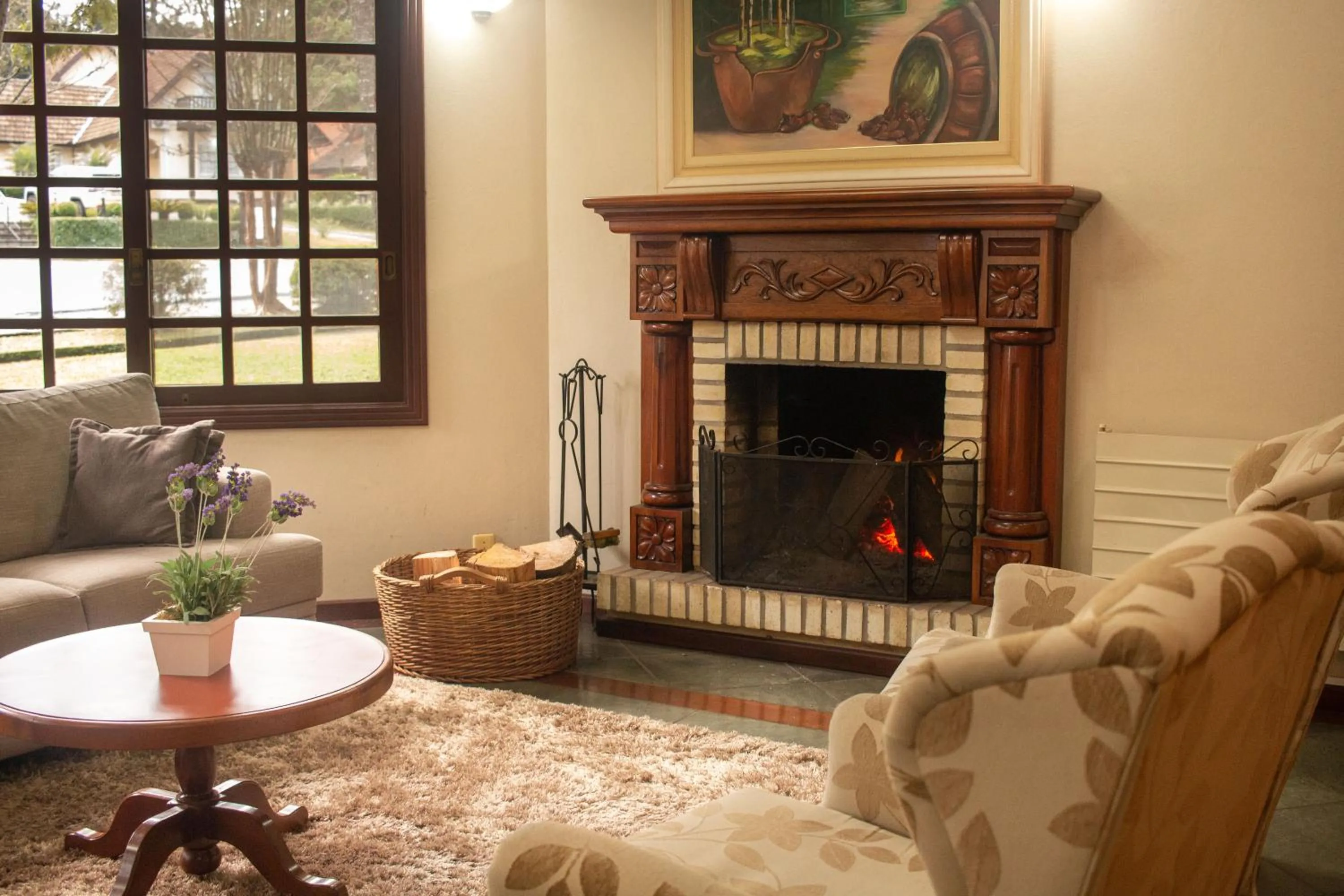 Communal lounge/ TV room in Hotel Pousada do Bosque