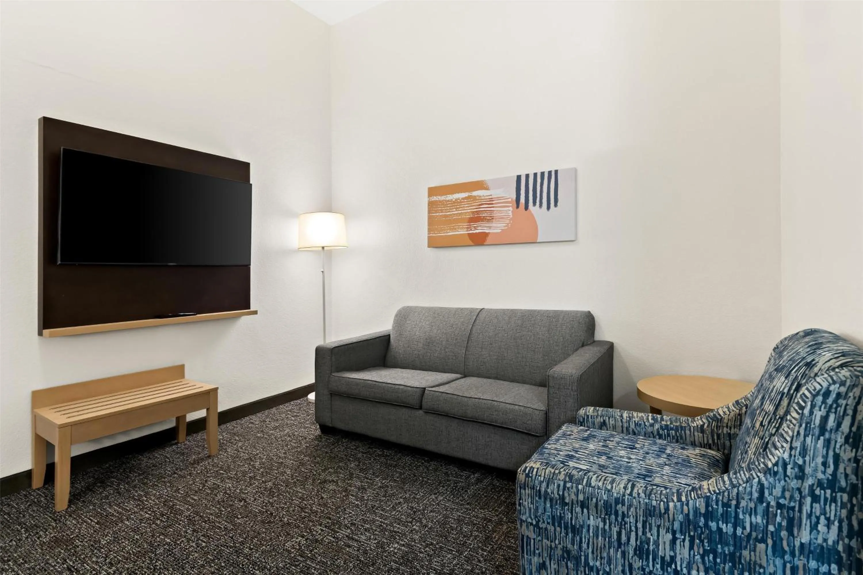 Living room in Spark by Hilton Panama City Beach