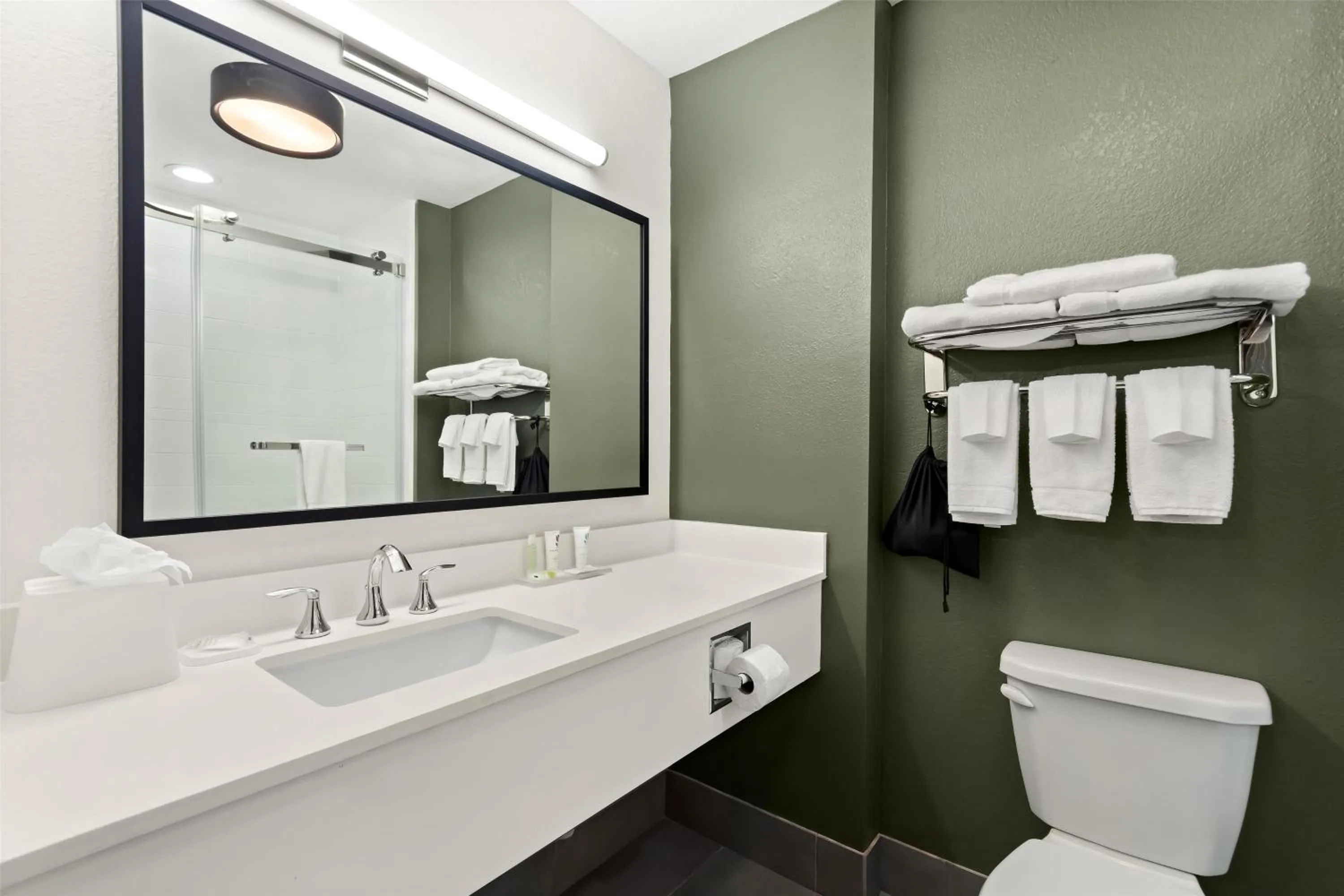 Bathroom in Spark by Hilton Panama City Beach