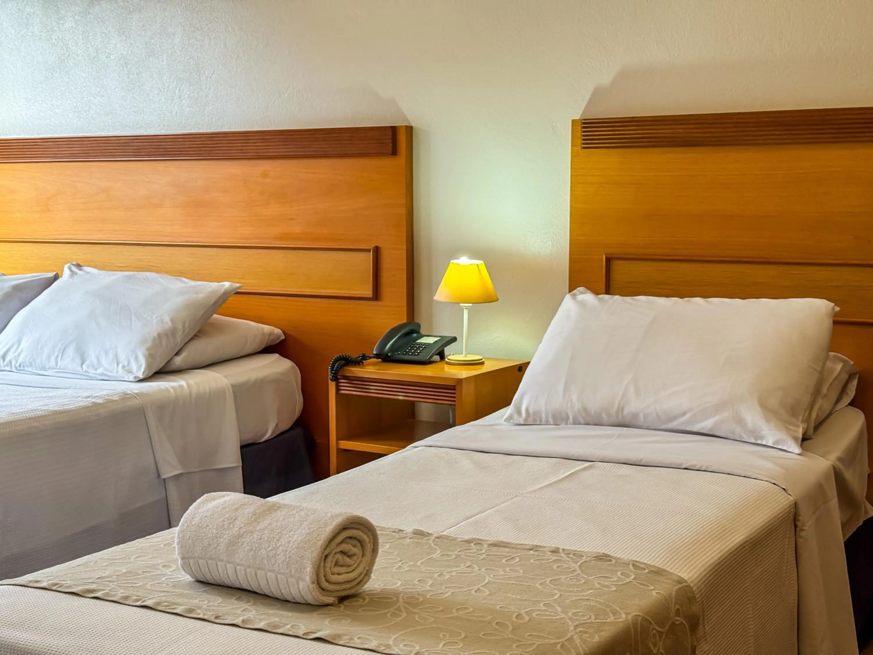 Bed in Hotel Tissiani Canela