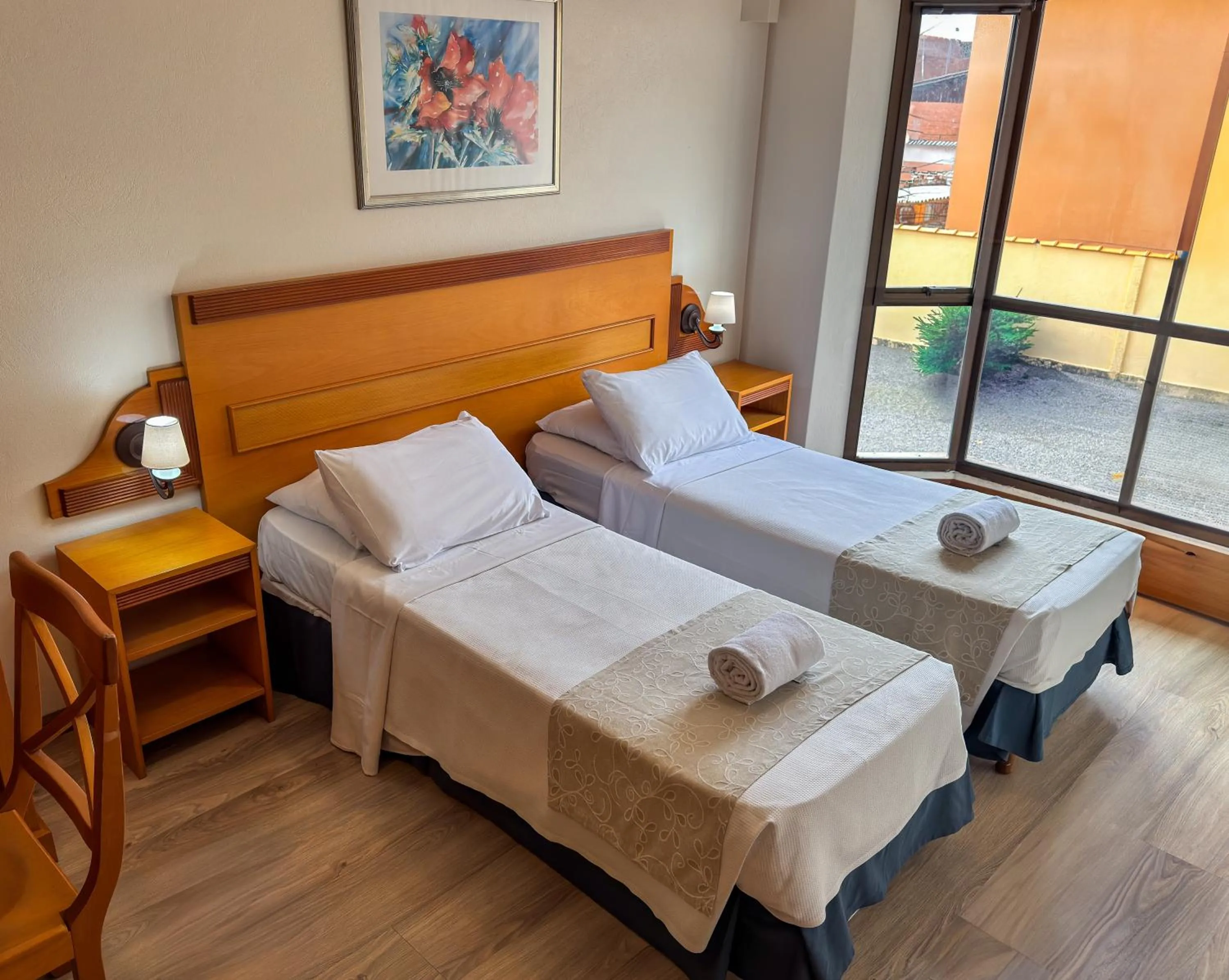 Bed in Hotel Tissiani Canela