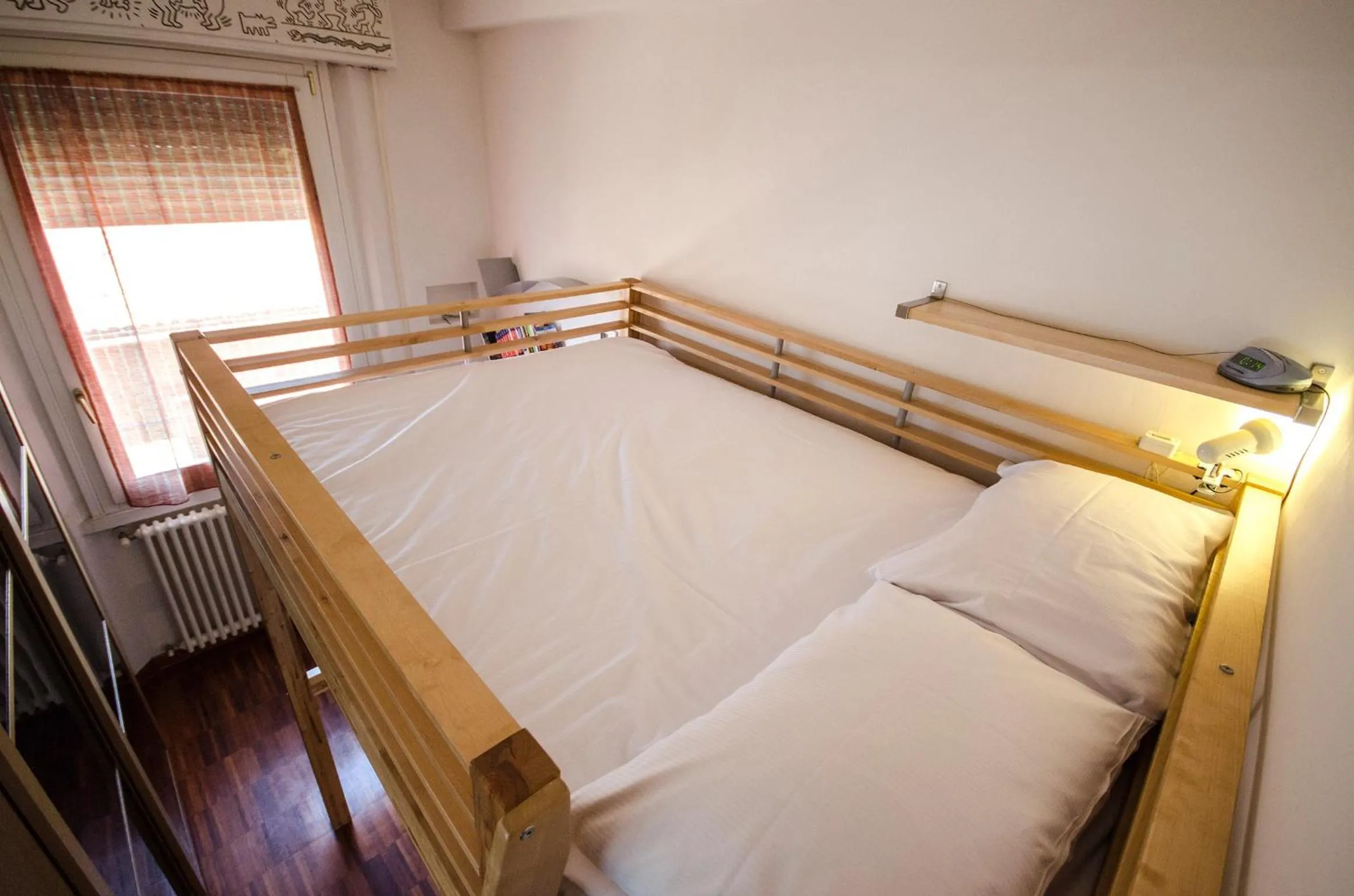 Bed in Minzoni Apartment