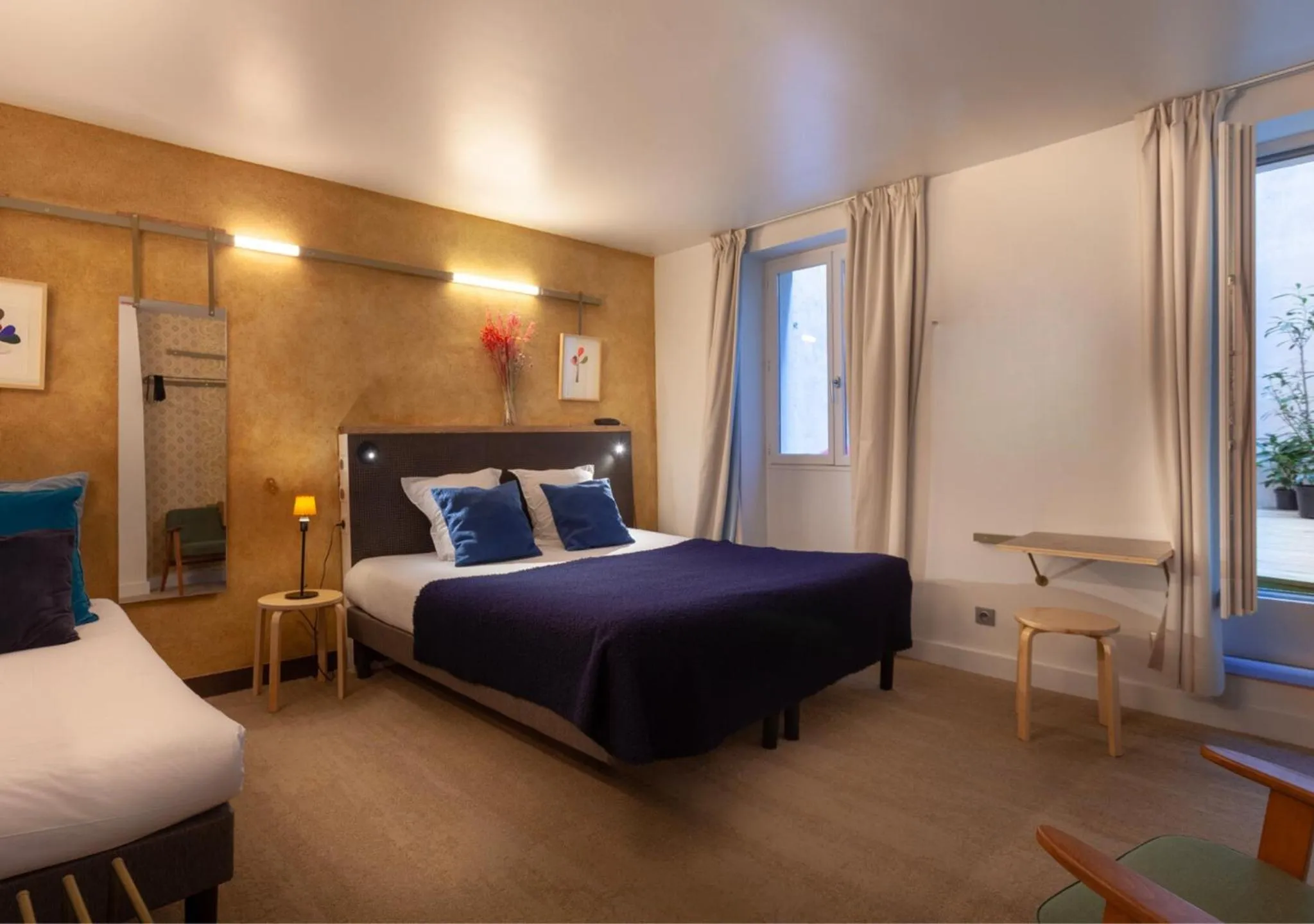 Bedroom, Bed in Hôtel La Nouvelle République & Hammam