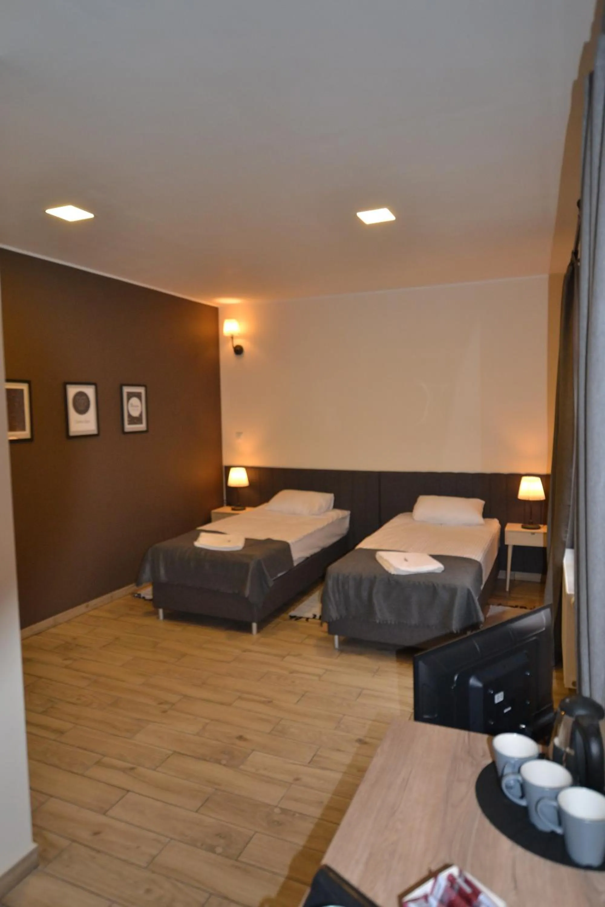 Bed in SleepWell Apartments