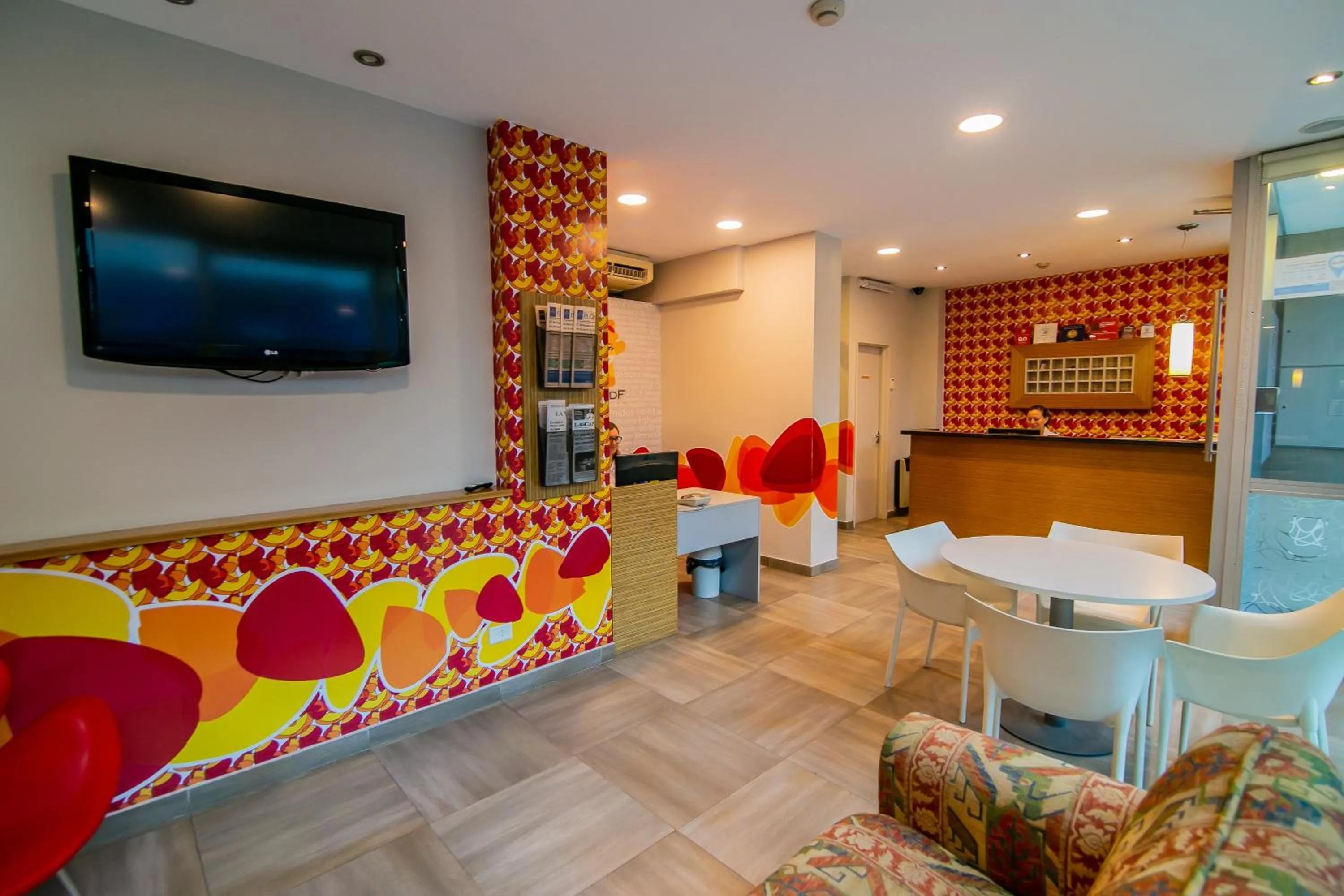 Communal lounge/ TV room in Roberta Rosa De Fontana Suites