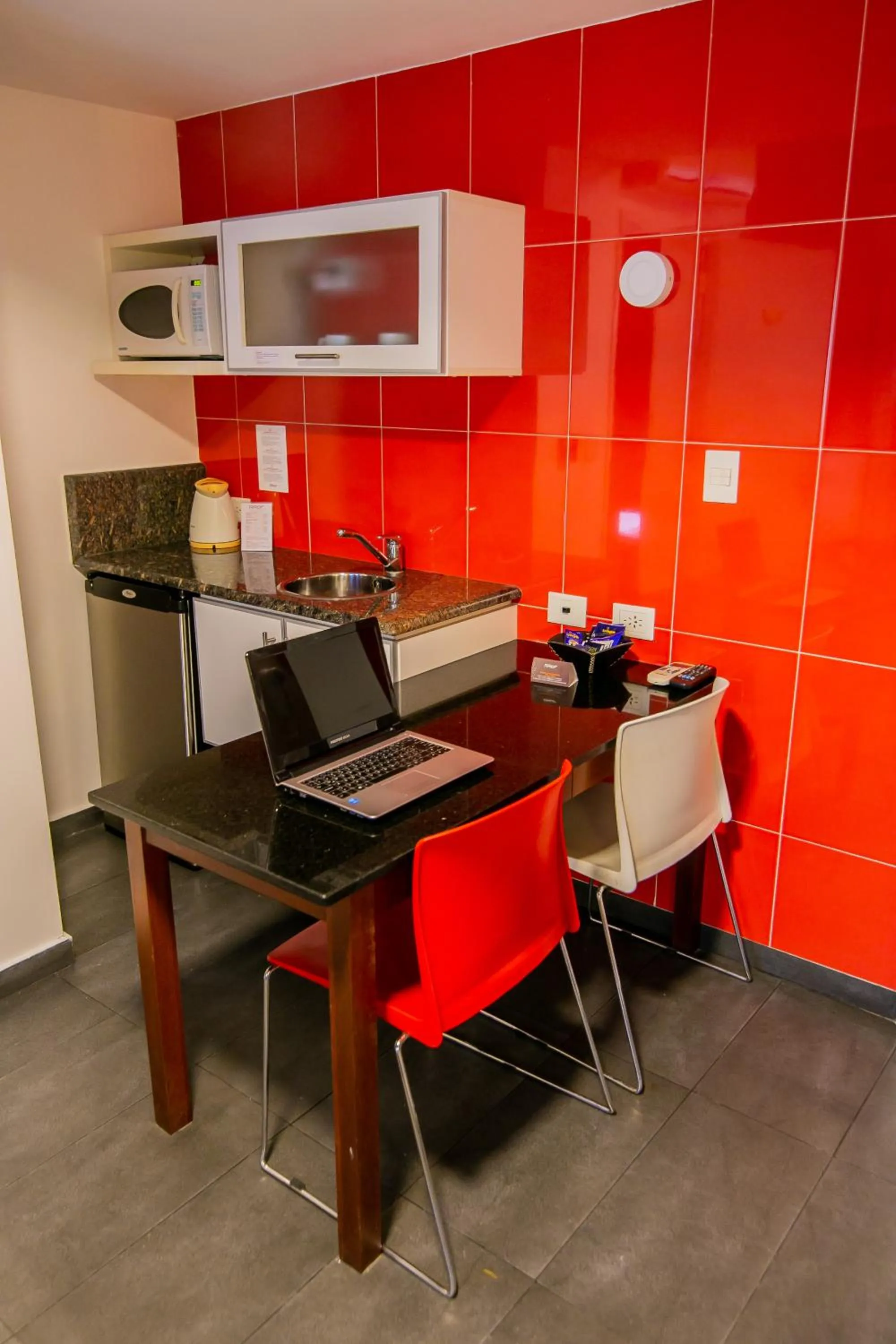 Kitchen or kitchenette in Roberta Rosa De Fontana Suites