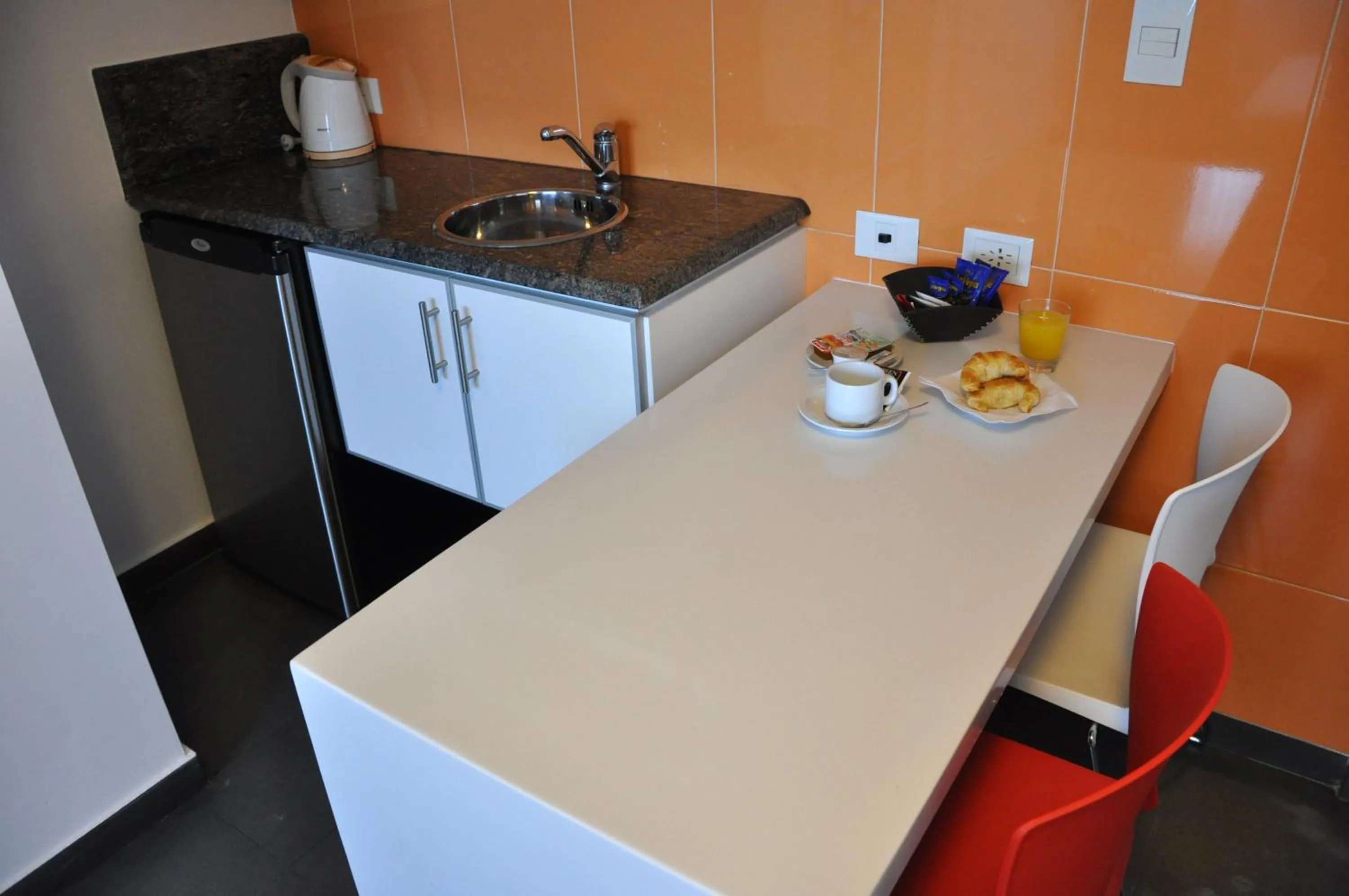 Kitchen or kitchenette in Roberta Rosa De Fontana Suites