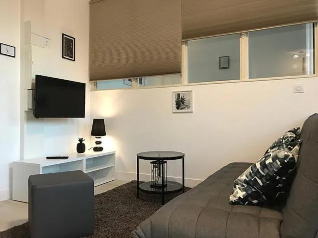 Living room in Appart'hôtel Chambrappart