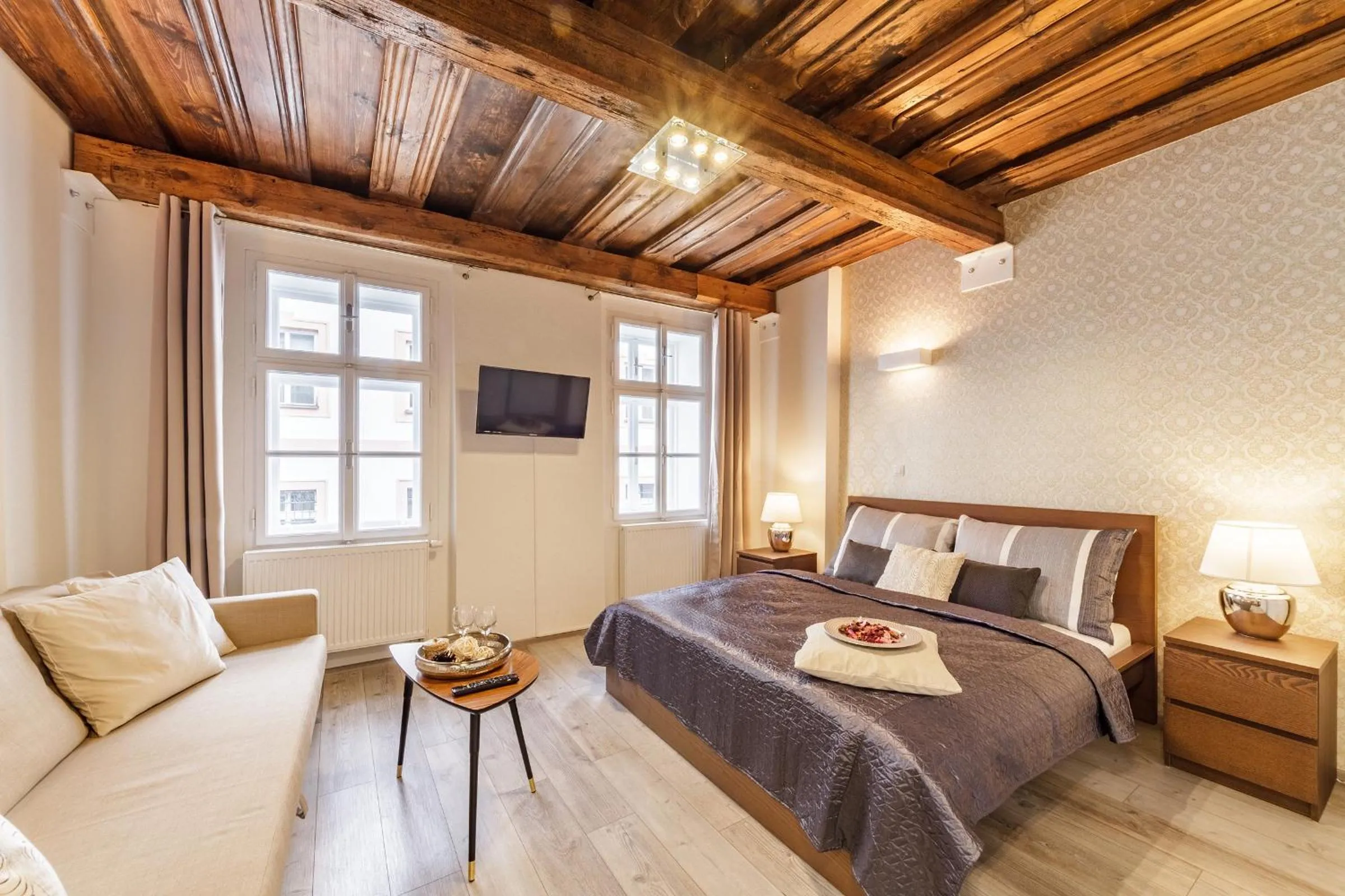 Bed in Downtown Royal Apartments