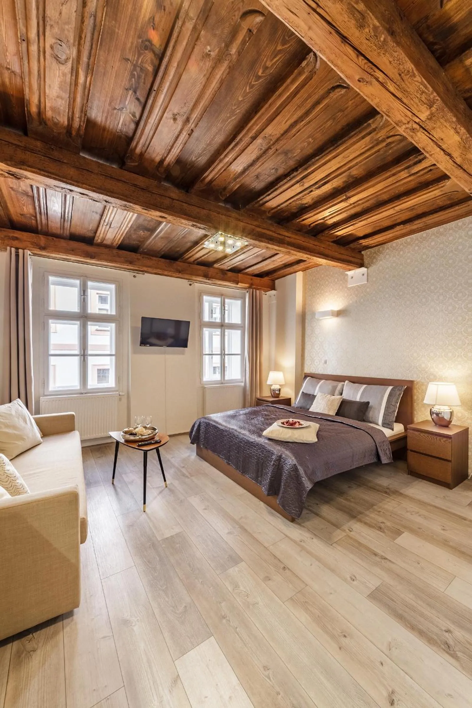 Bed in Downtown Royal Apartments