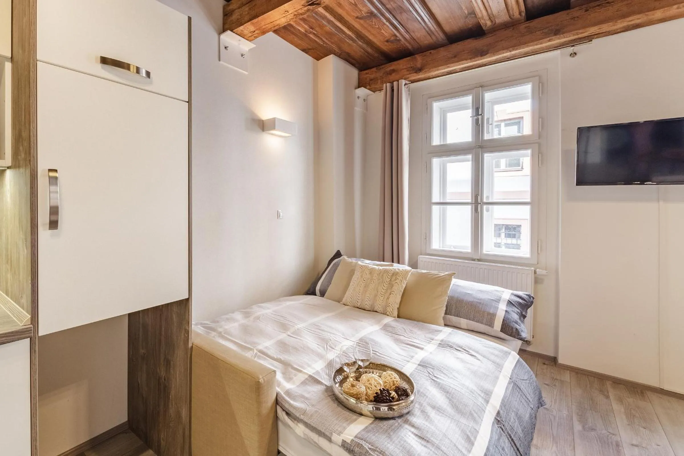 Bed in Downtown Royal Apartments