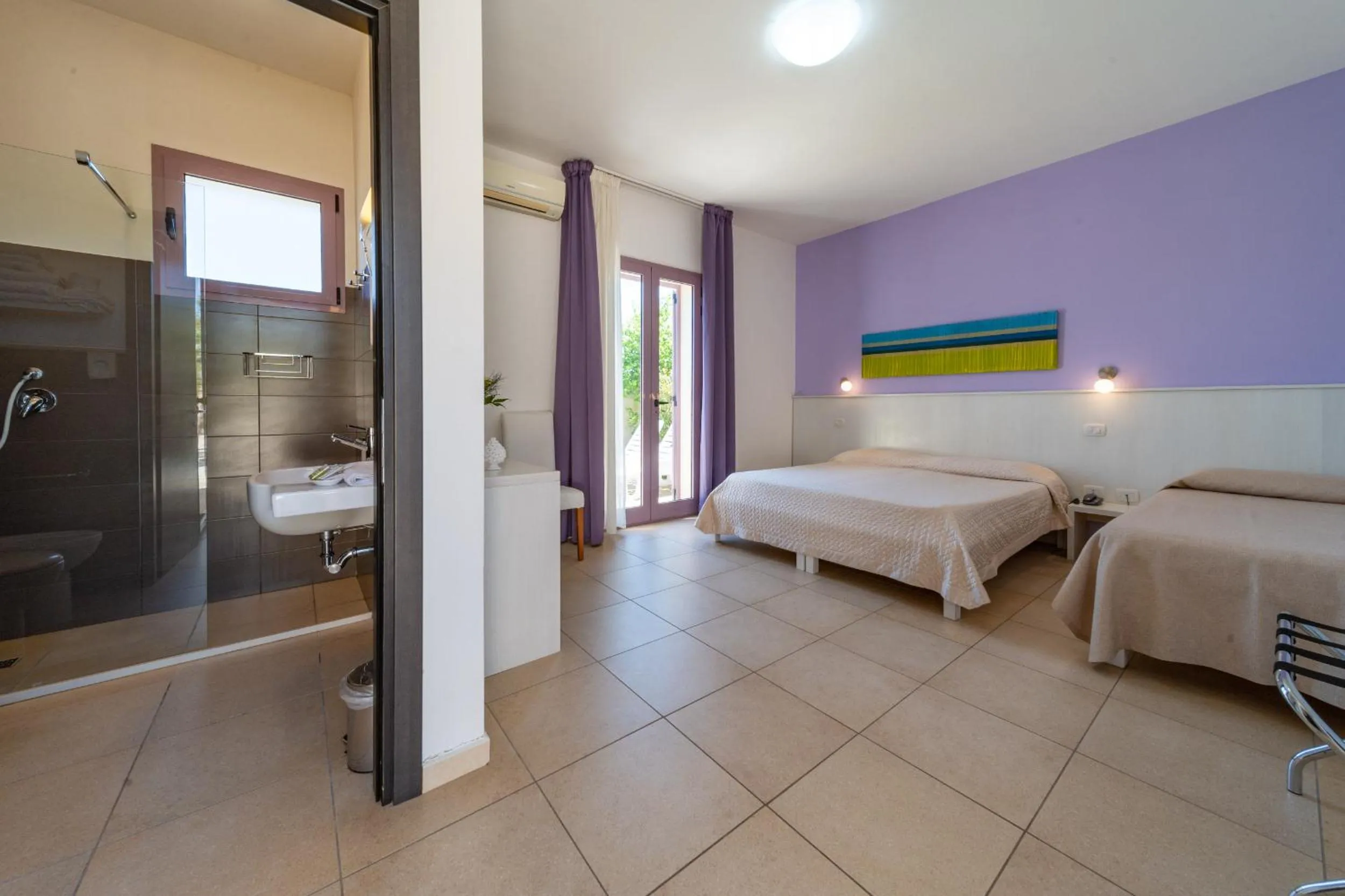 Photo of the whole room, Bed in Corte dei Melograni Hotel Resort