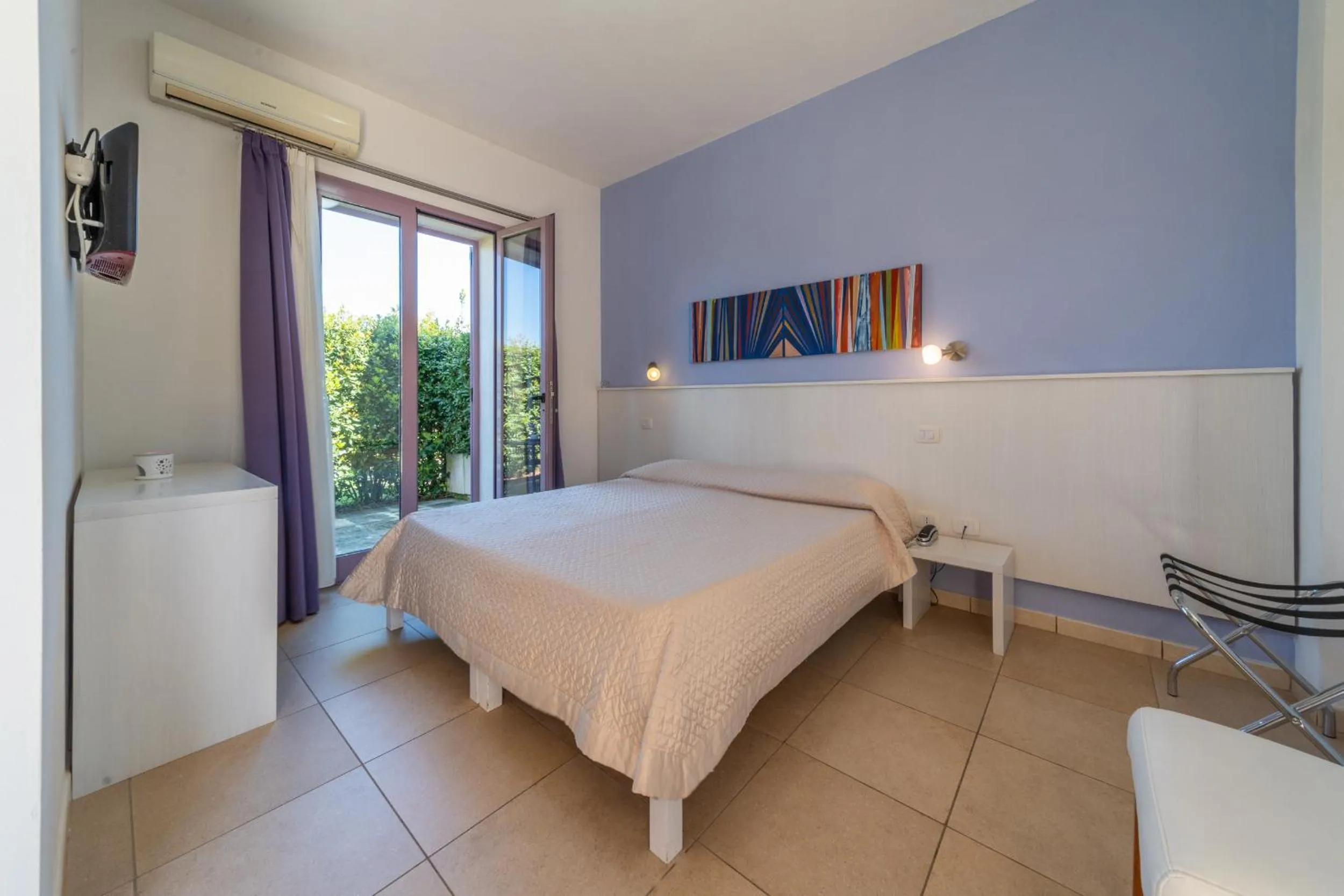 Bedroom, Bed in Corte dei Melograni Hotel Resort