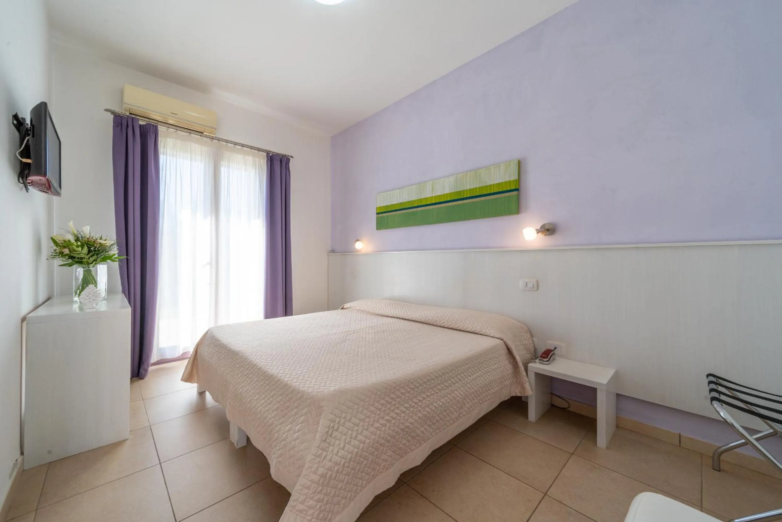 Bed in Corte dei Melograni Hotel Resort