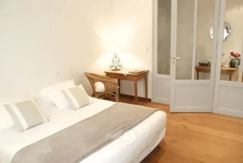 Bed in Le Pavillon Bleu