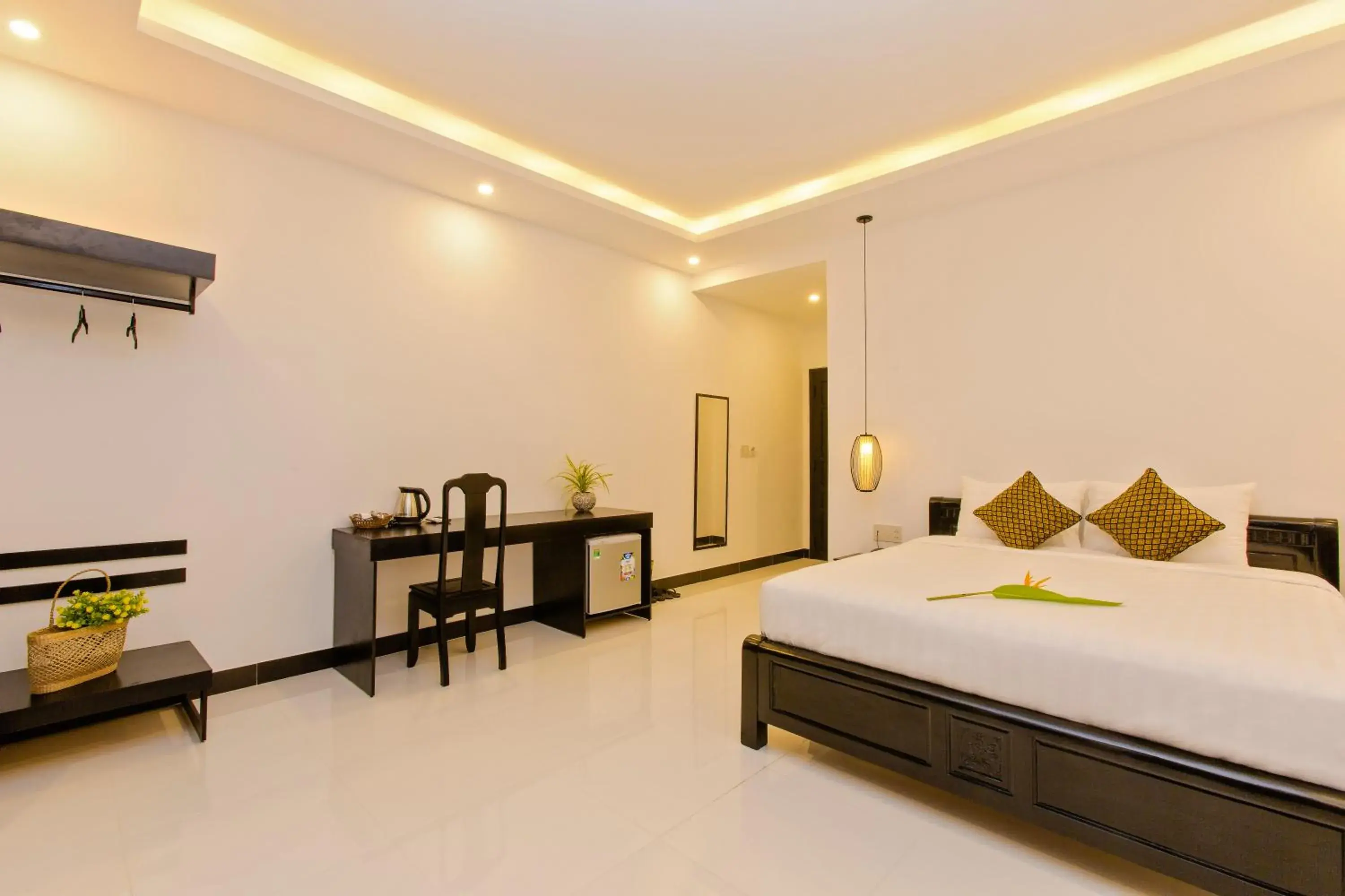 Seating area, Bed in Hoi An Sunny Pool Villa Seating area, Bed in Hoi An Sunny Pool Villa