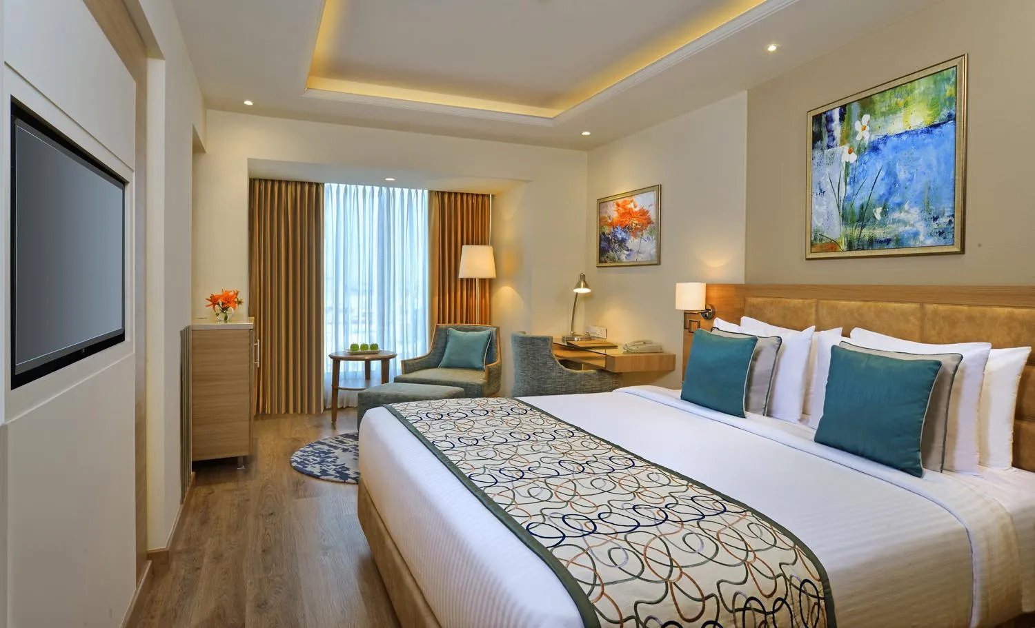 Photo of the whole room, Bed in Golden Sarovar Portico