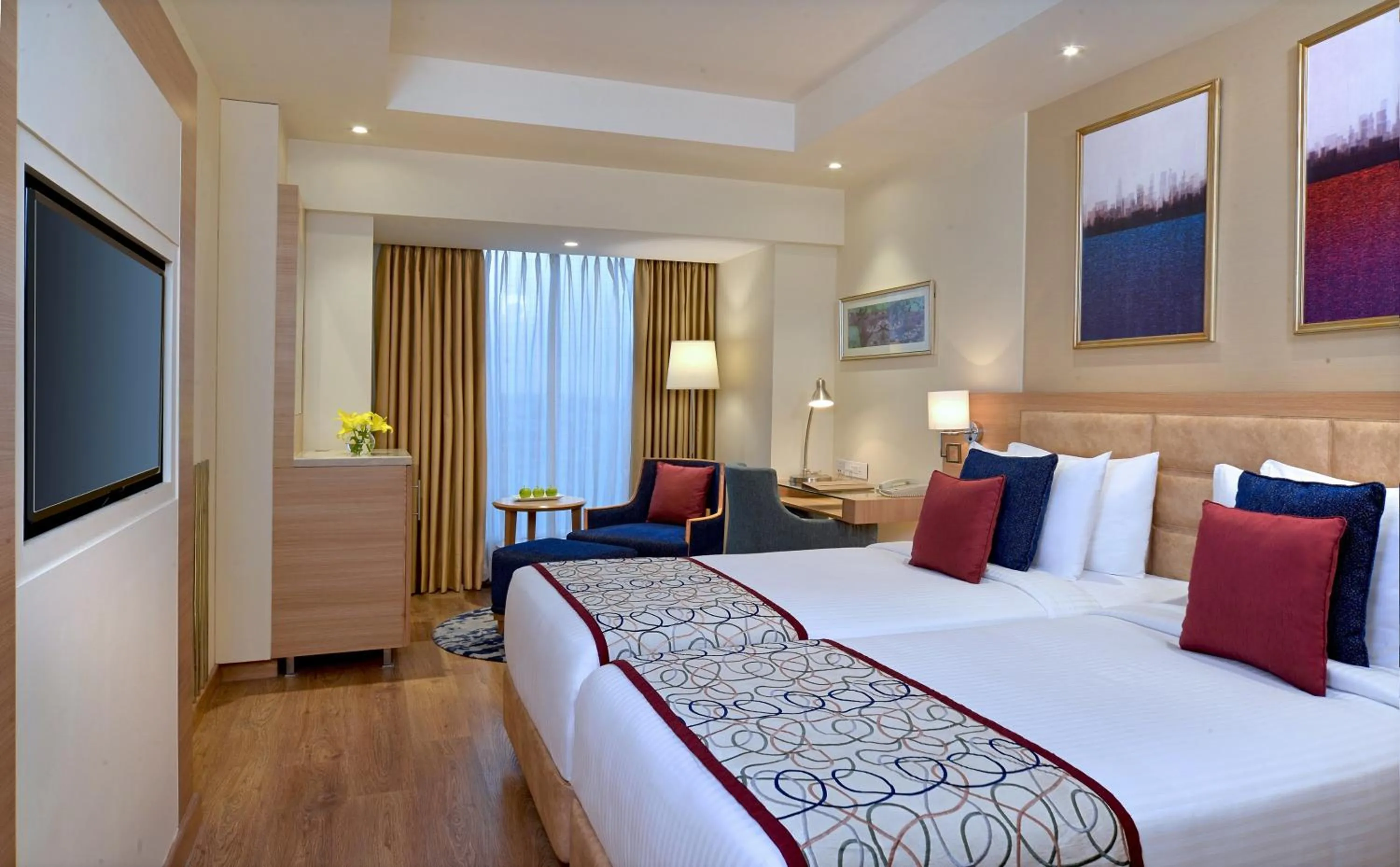 Photo of the whole room, Bed in Golden Sarovar Portico