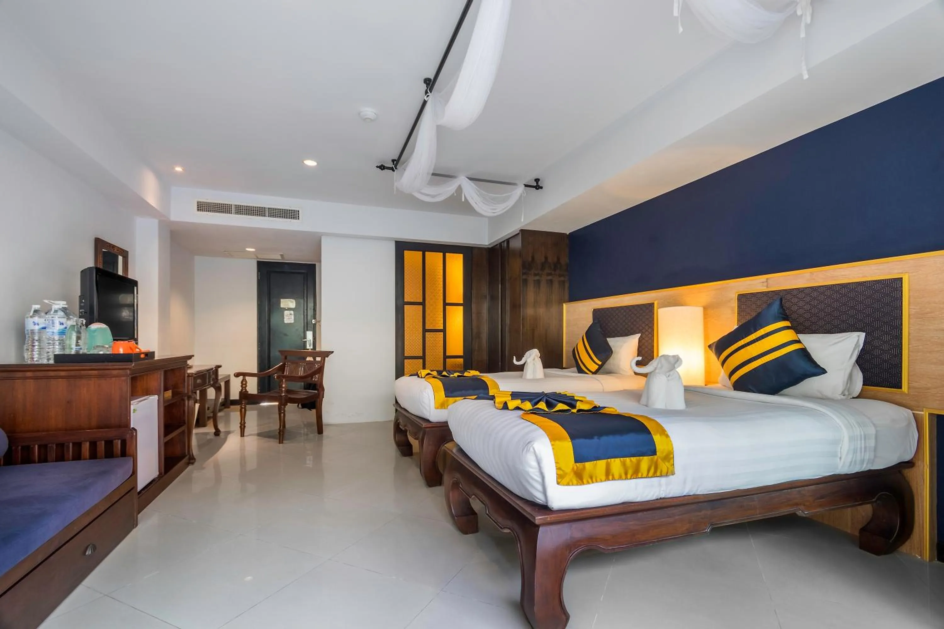 Bed in Diamond Cottage Resort & Spa