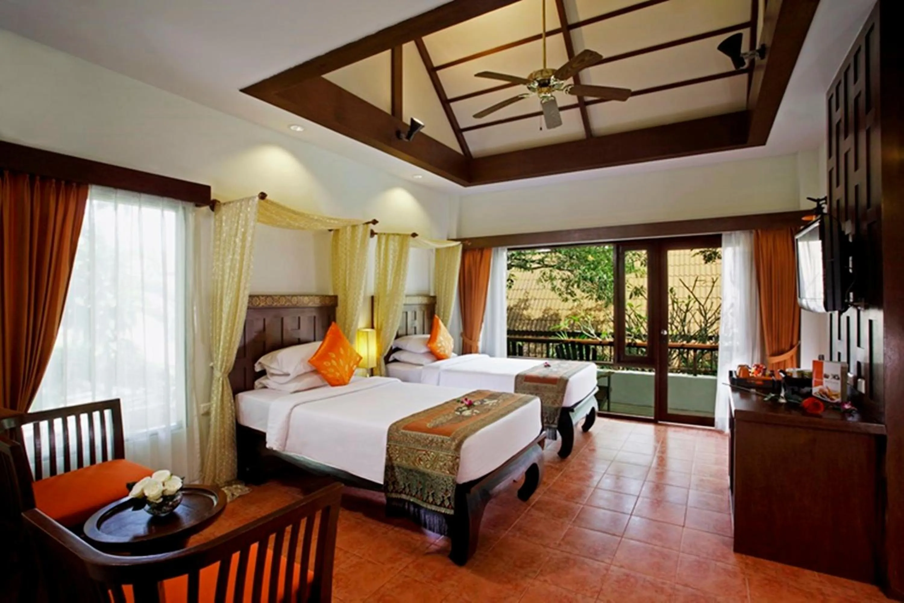Bed in Diamond Cottage Resort & Spa