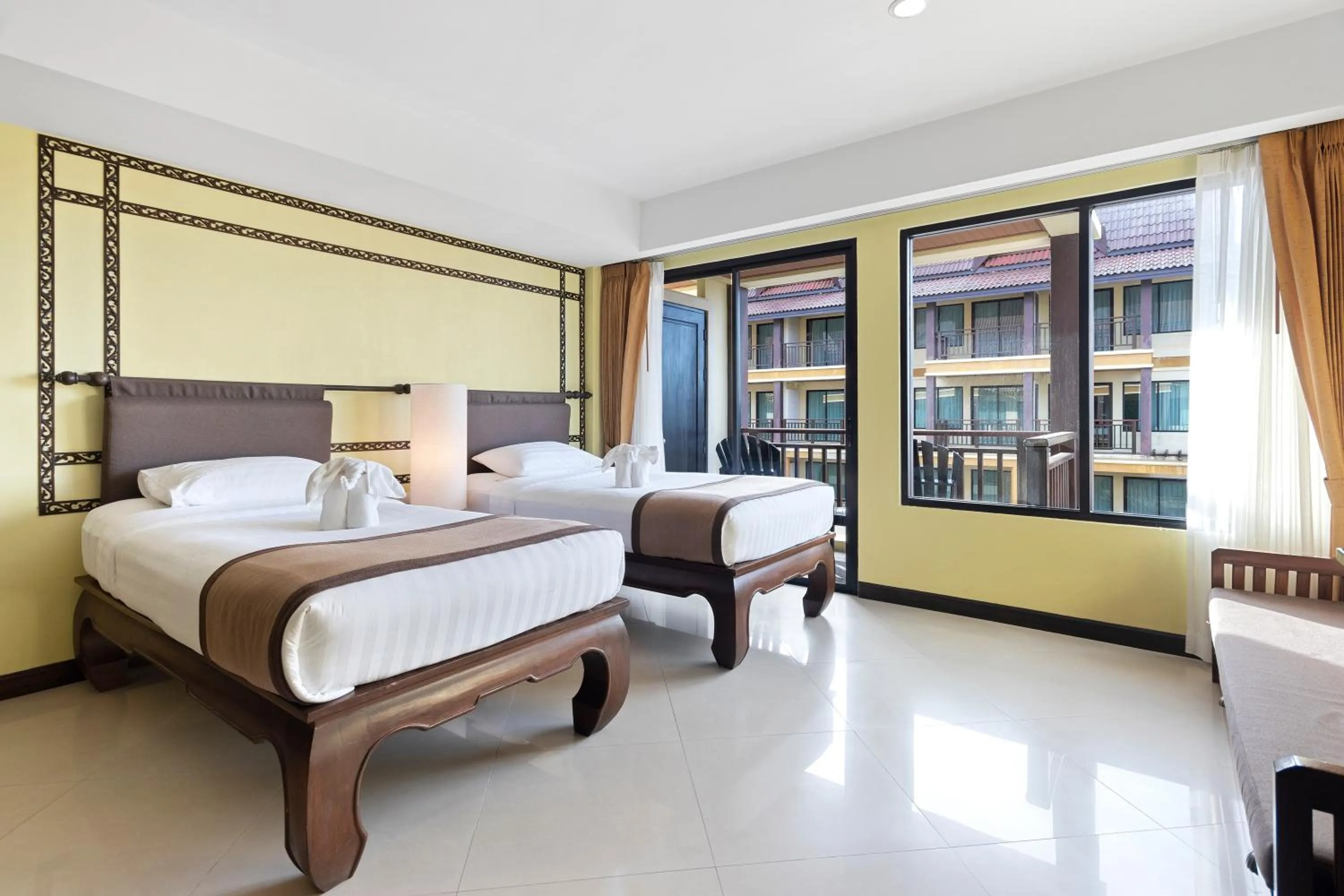 Bed in Diamond Cottage Resort & Spa