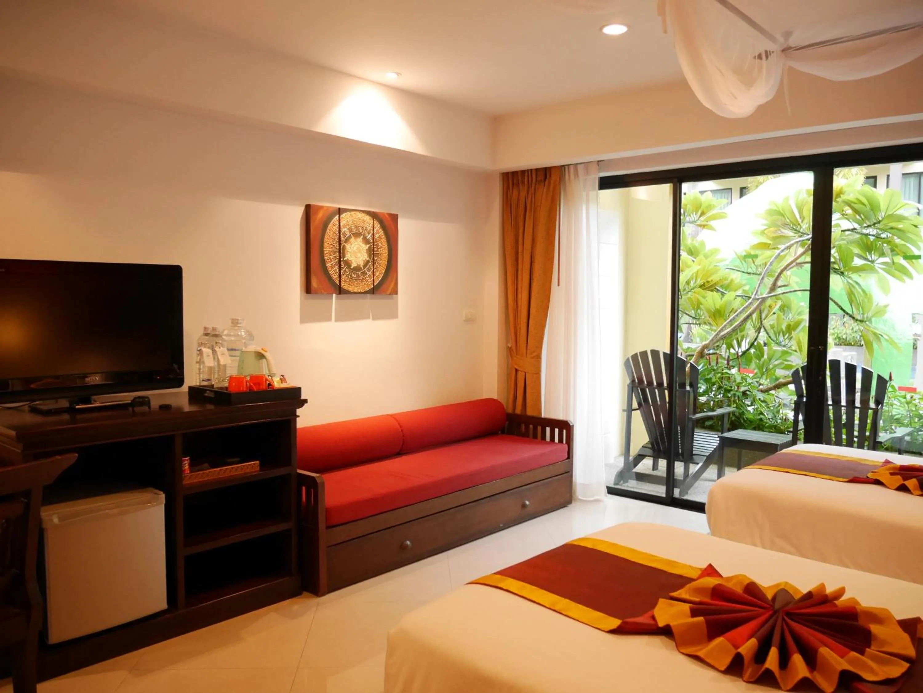 Bed in Diamond Cottage Resort & Spa