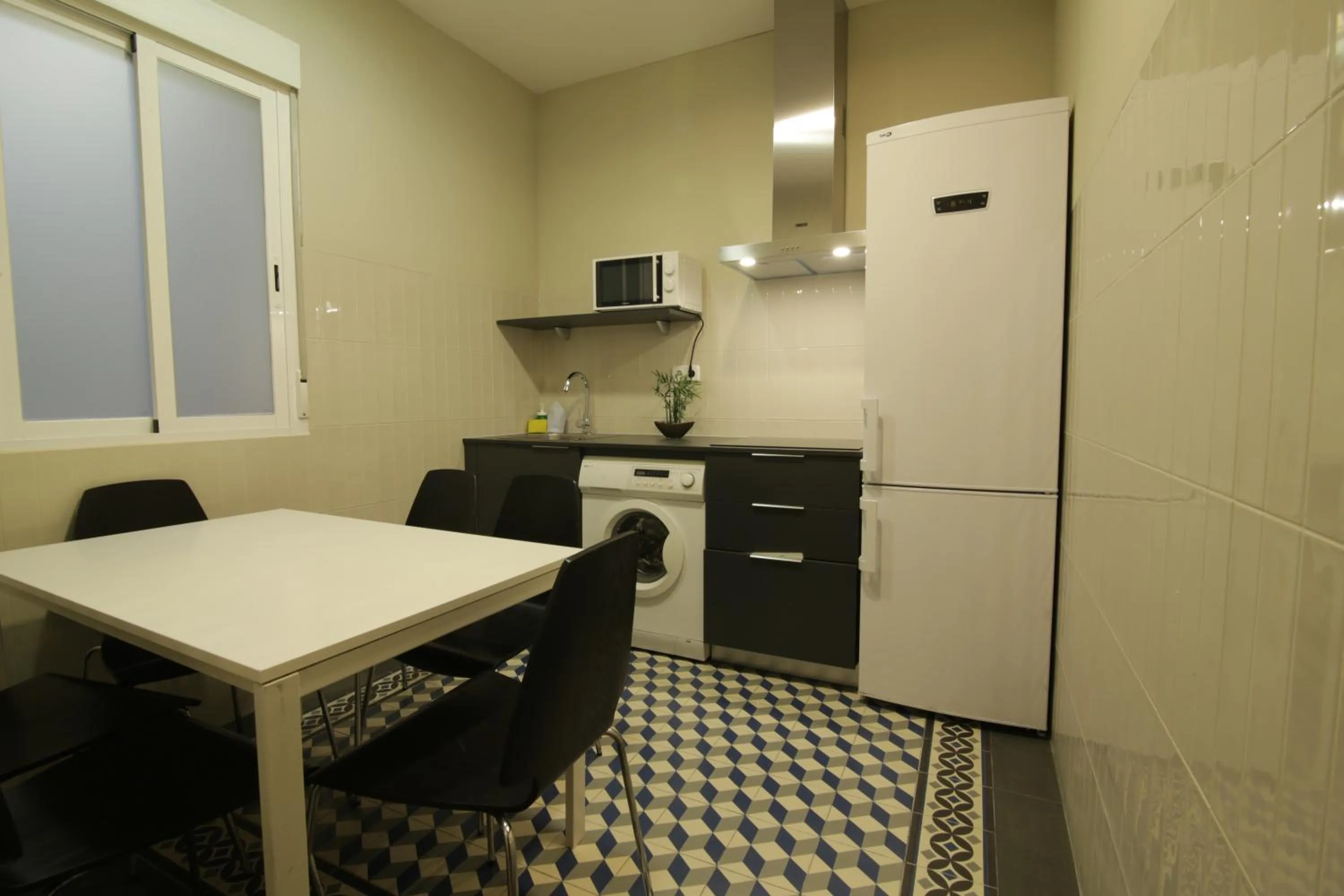 Kitchen or kitchenette in SUITES YOU Zinc