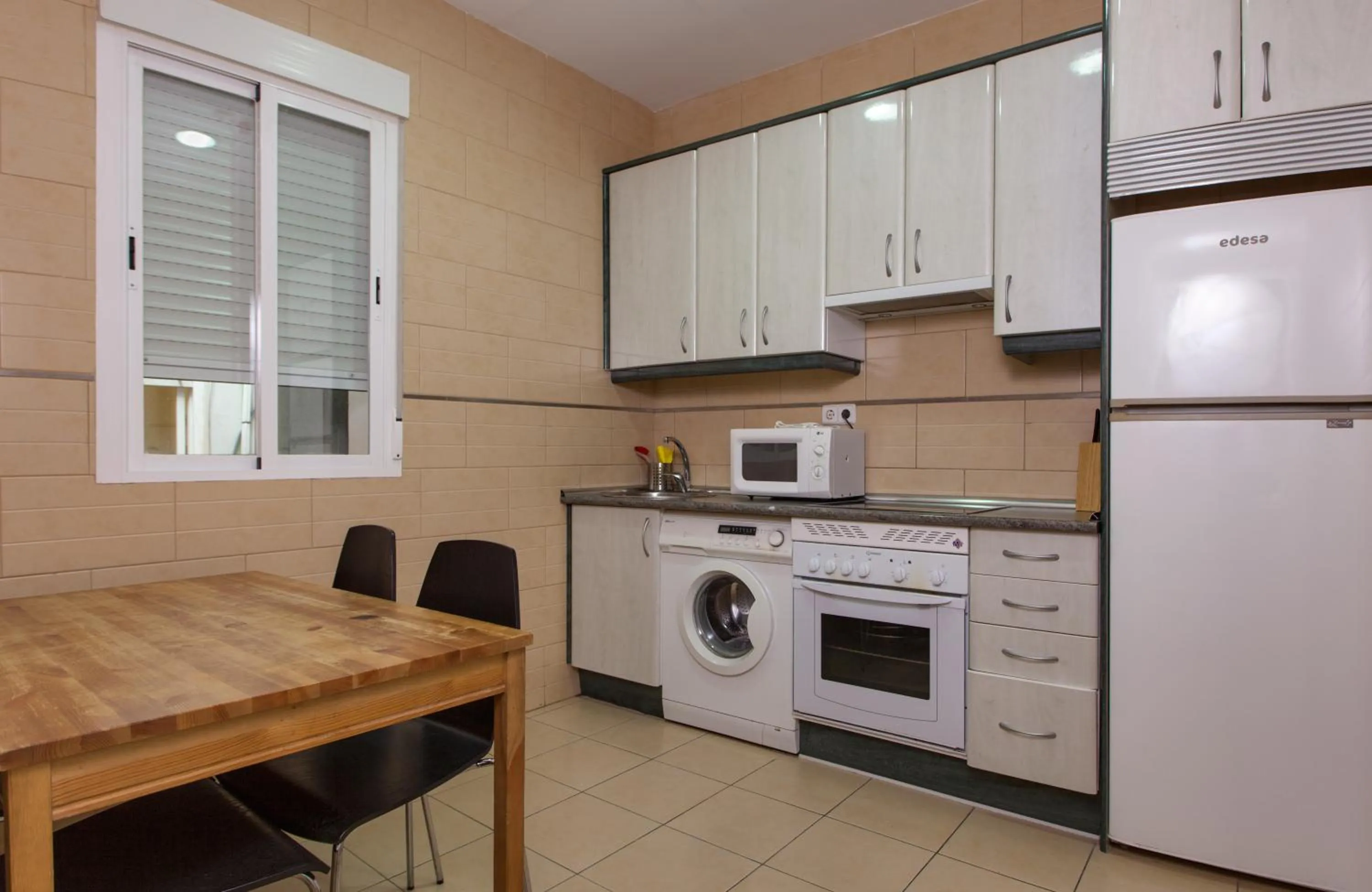 Kitchen or kitchenette in SUITES YOU Zinc