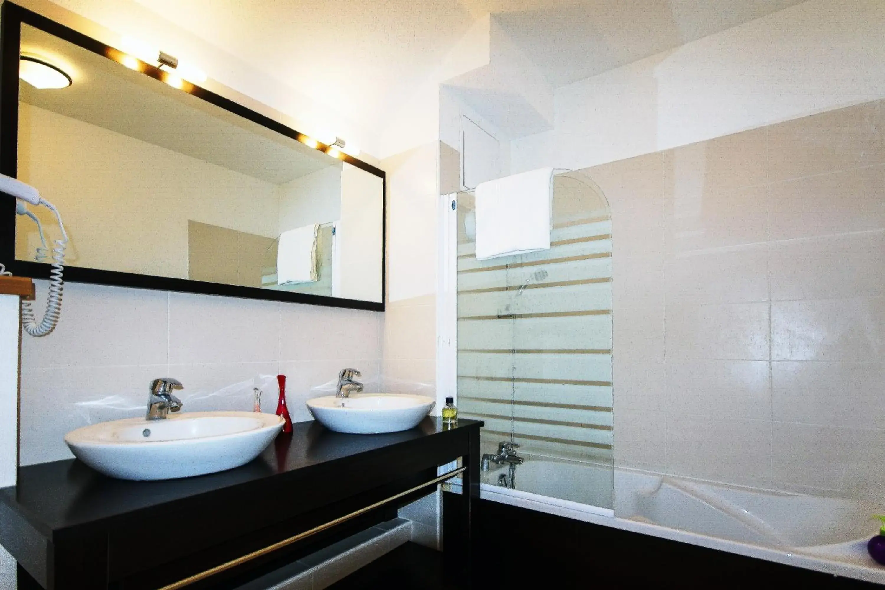 Bathroom in Résidence Néméa L'Aigle Bleu Bathroom in Résidence Néméa L'Aigle Bleu