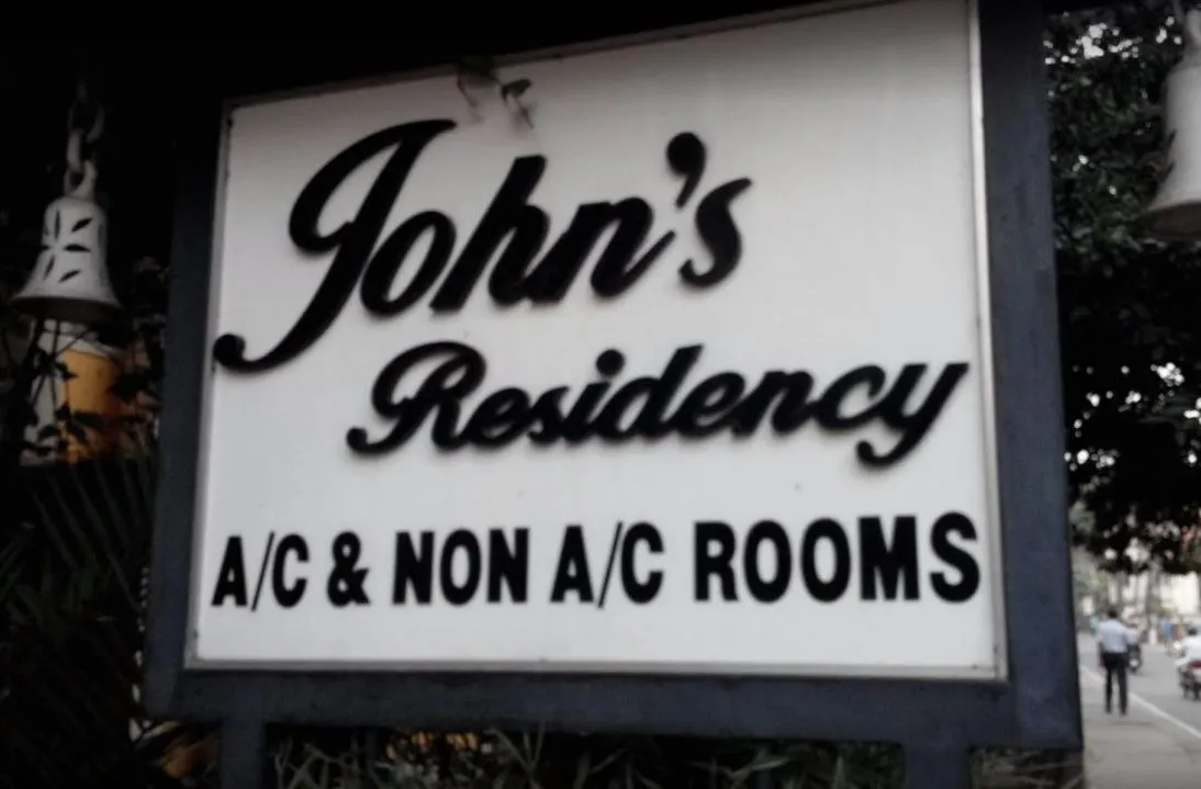 Property logo or sign in Johns Residency