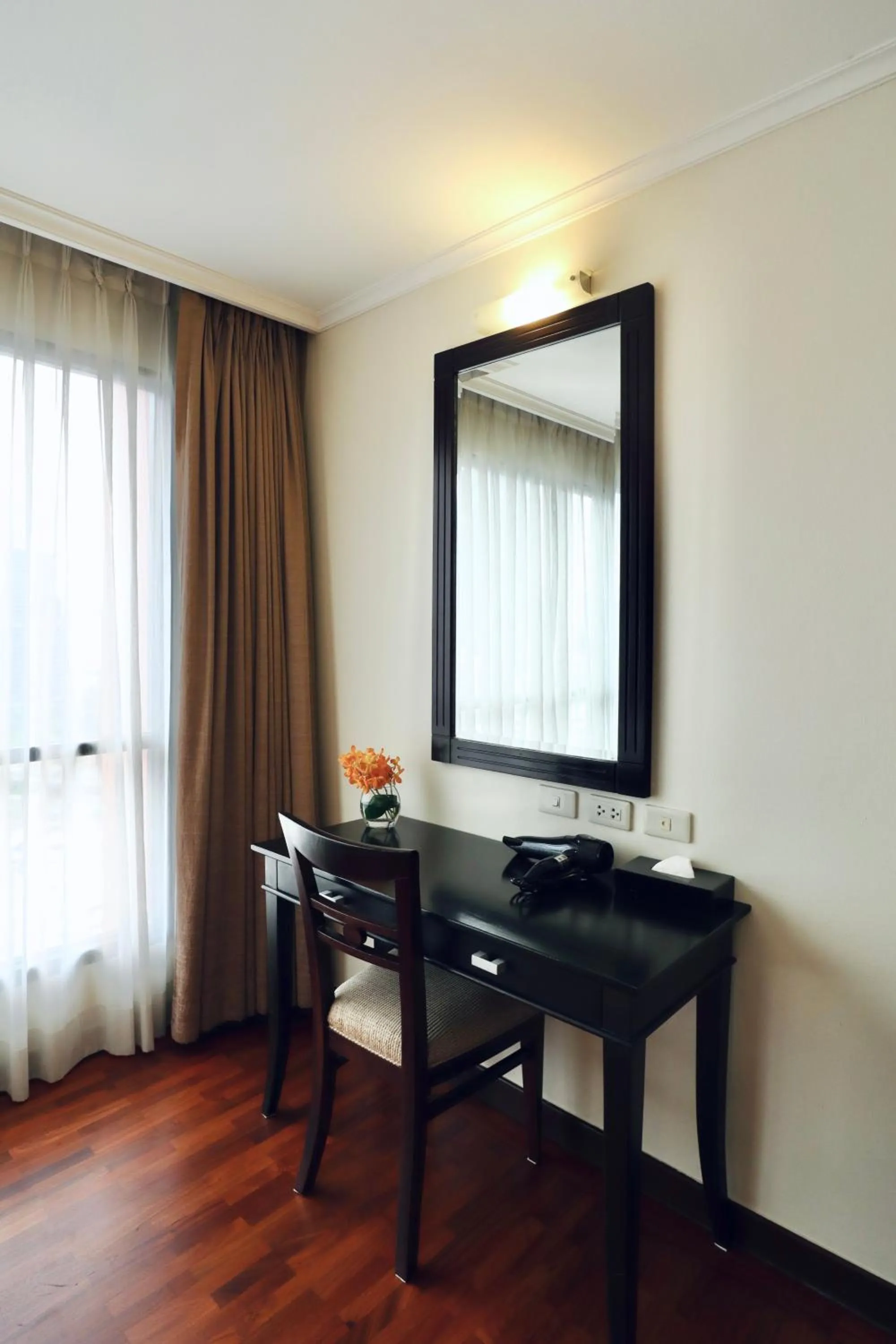 Seating area in Bandara Suites Silom, Bangkok