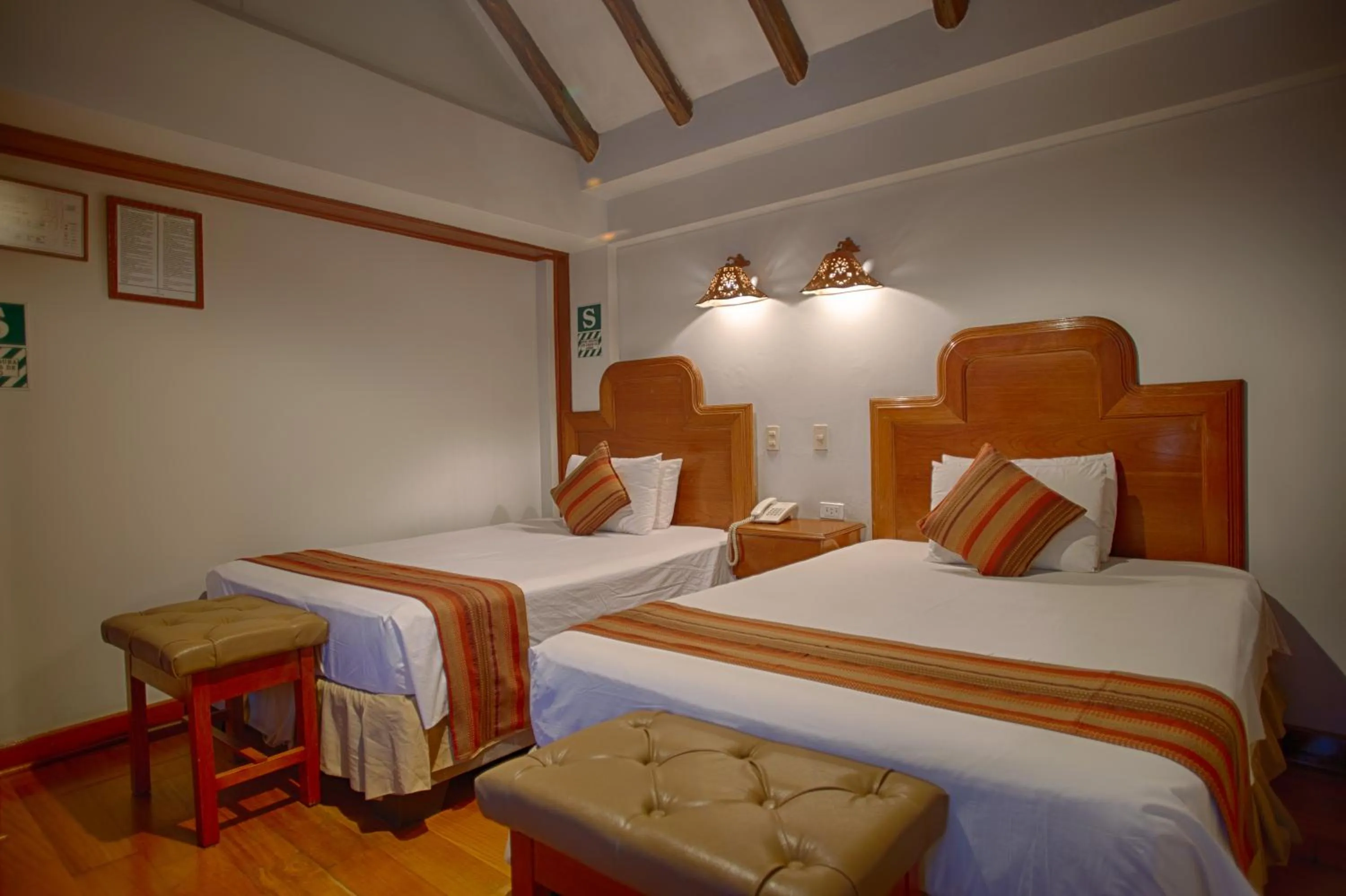 Bed in Munay Wasi Inn