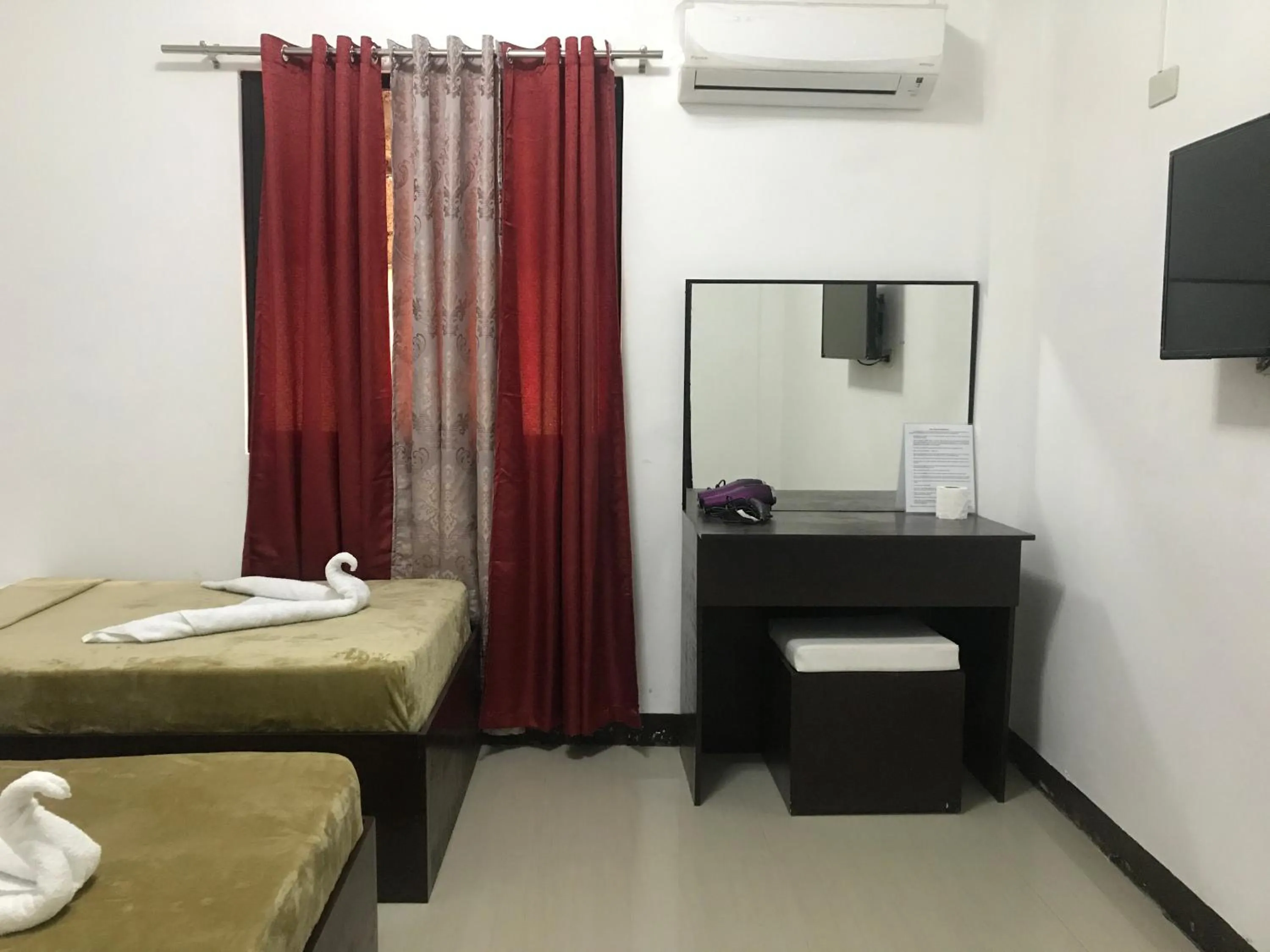 Bed in 4C's Tourist Lodge