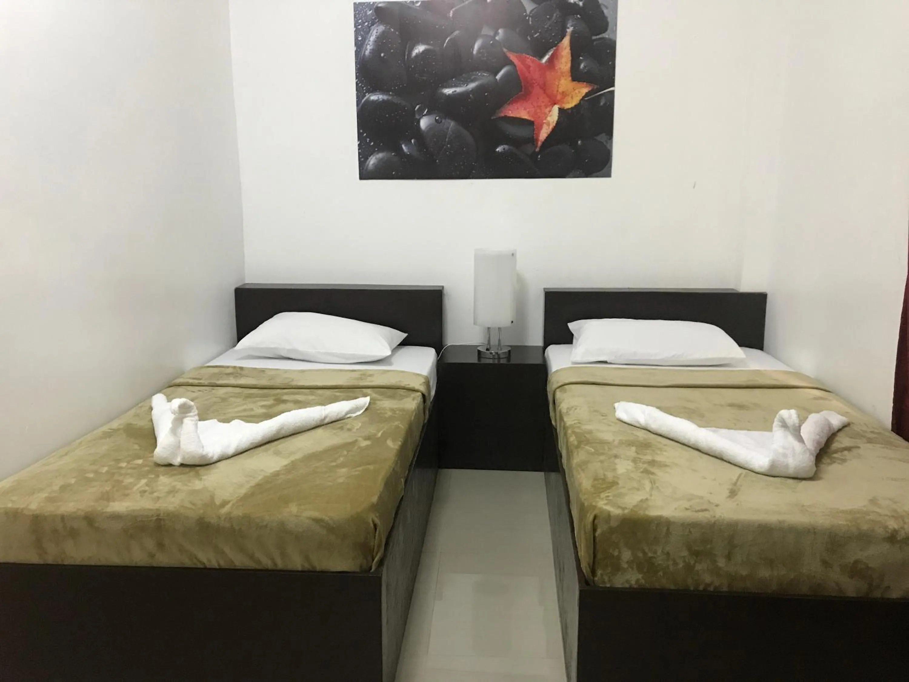 Bed in 4C's Tourist Lodge