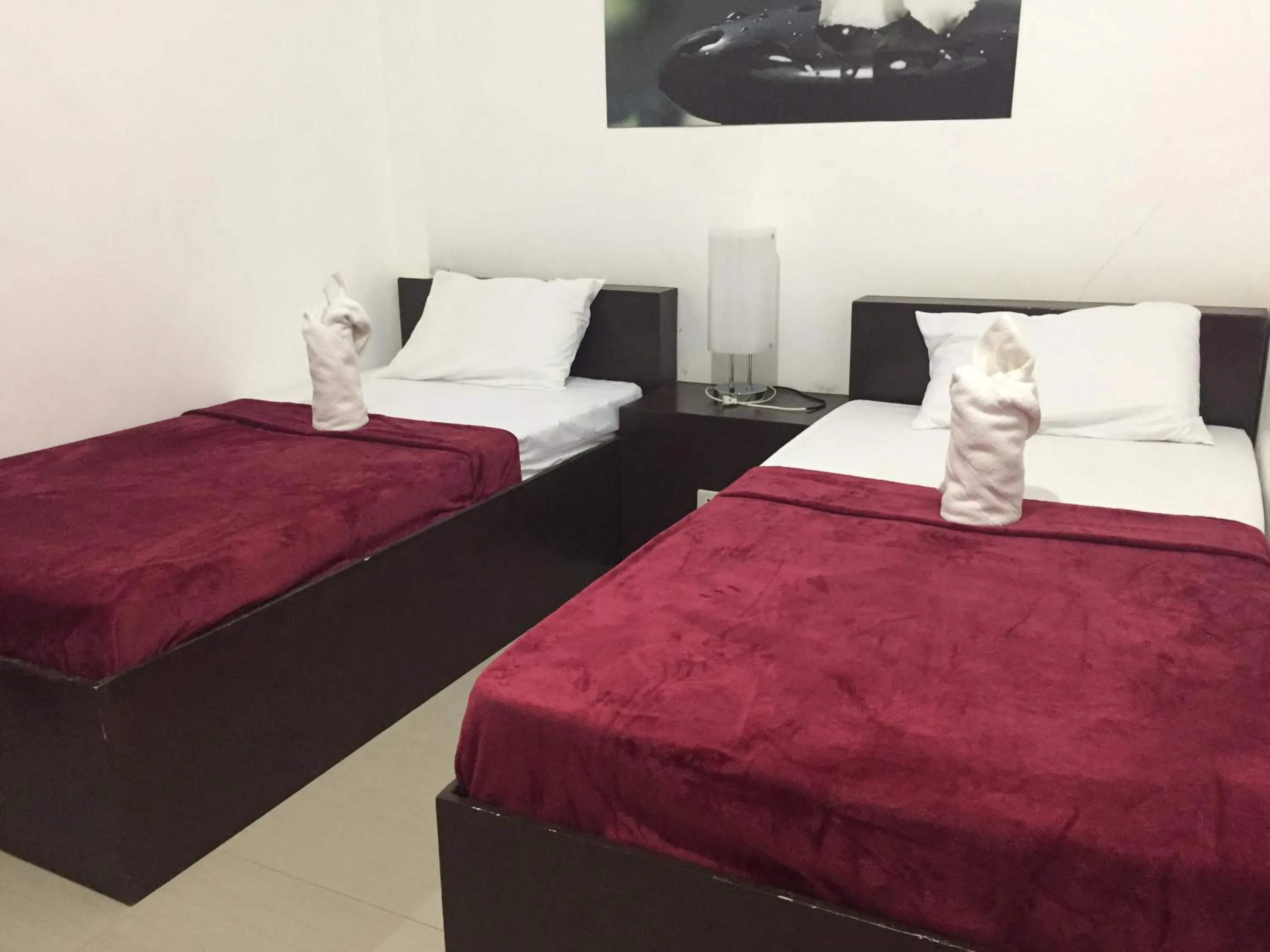 Bed in 4C's Tourist Lodge