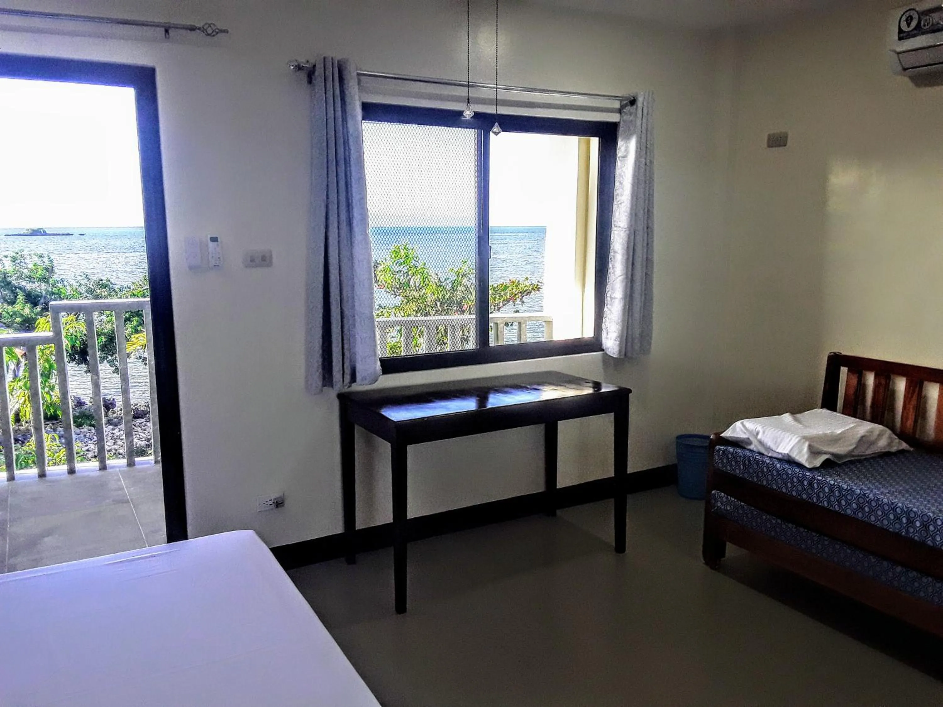 Seating area, Bed in Adayo Cove Resort