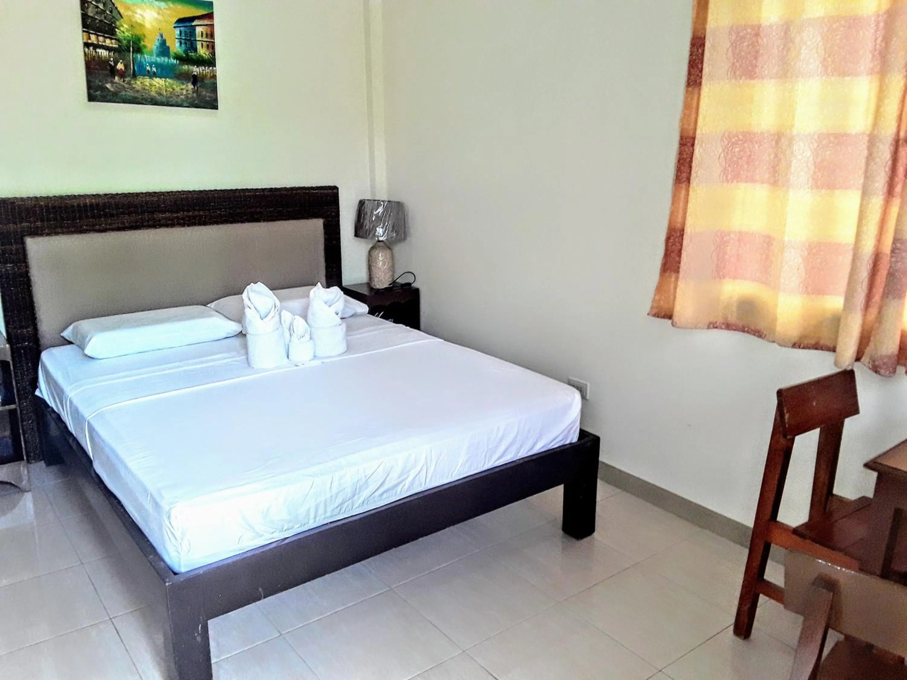 Bed in Adayo Cove Resort