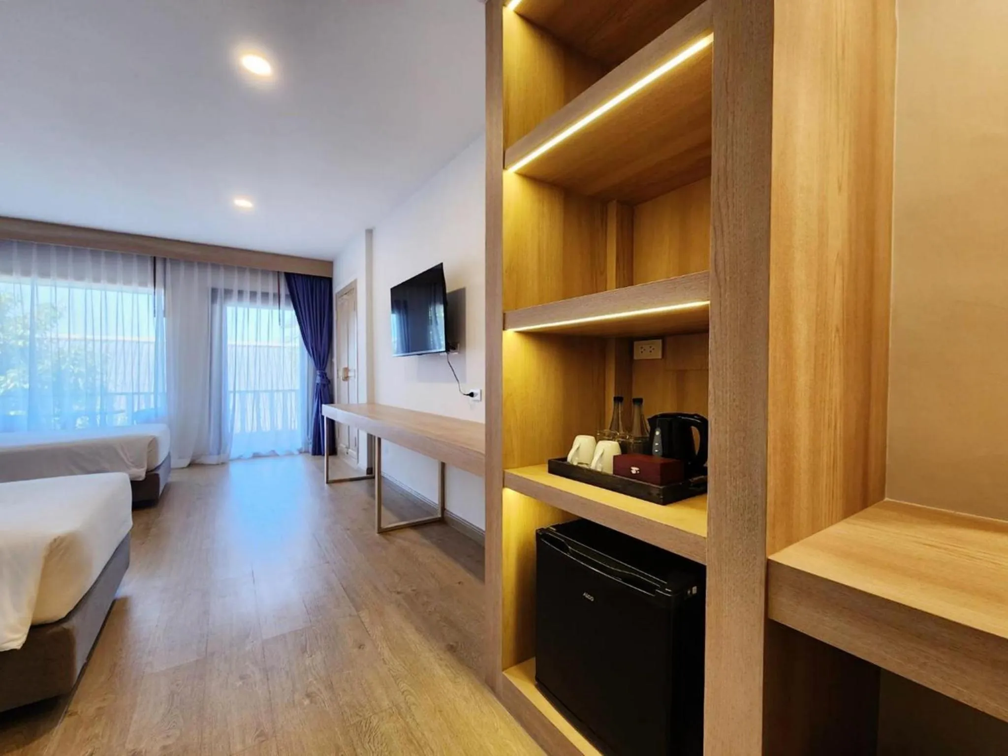 Seating area, Bed in Namaka Resort Kamala