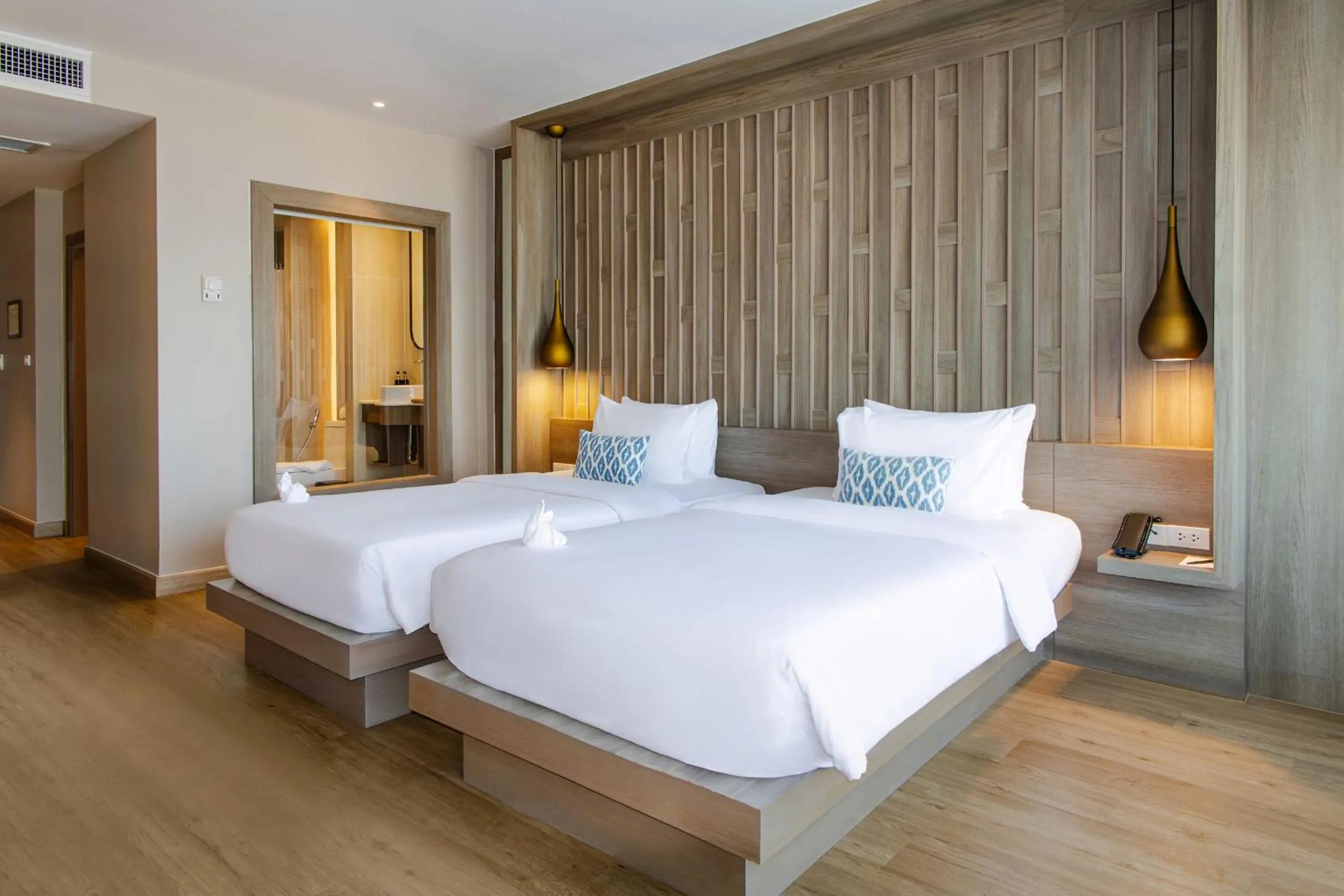 Bed in Namaka Resort Kamala