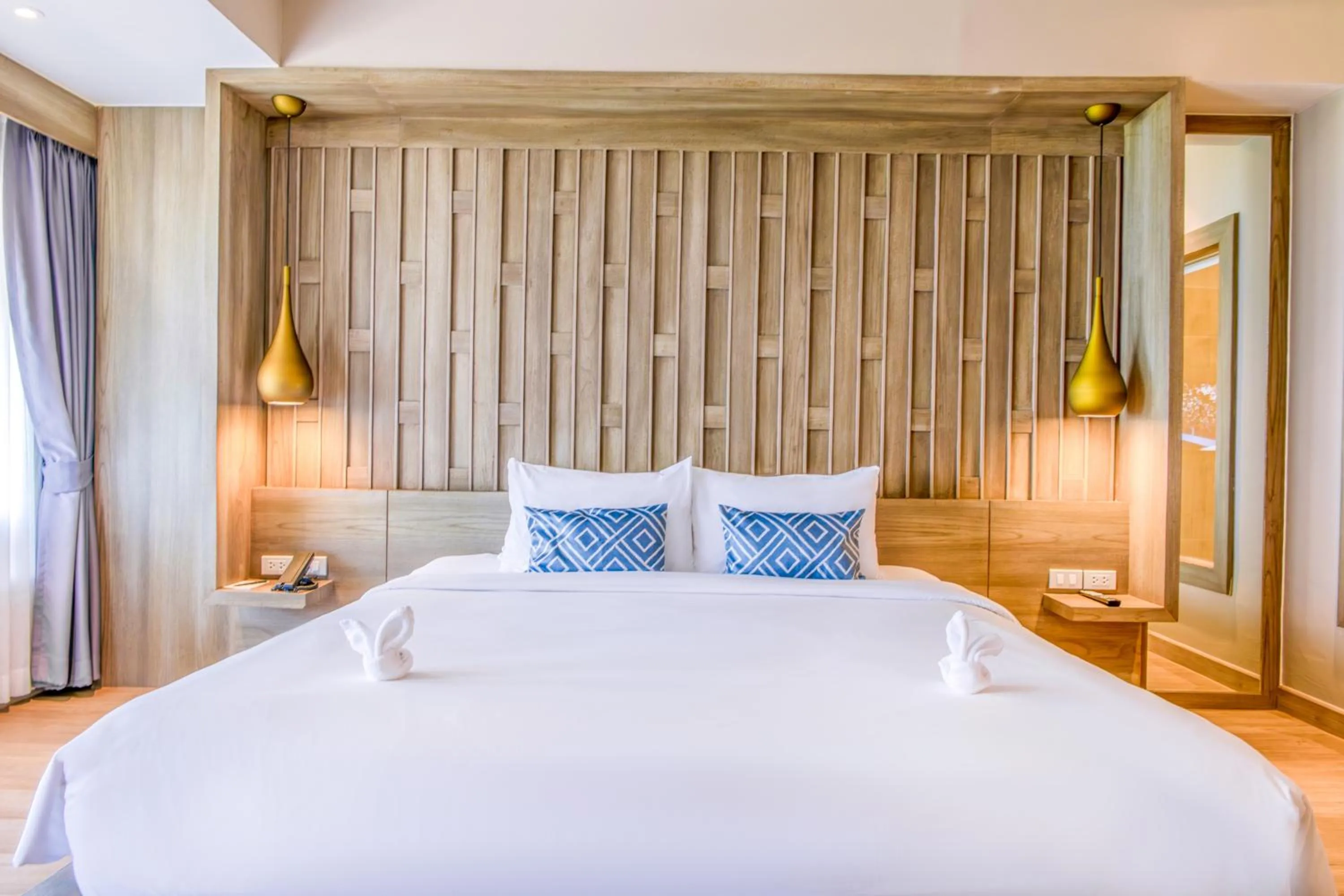 Bed in Namaka Resort Kamala