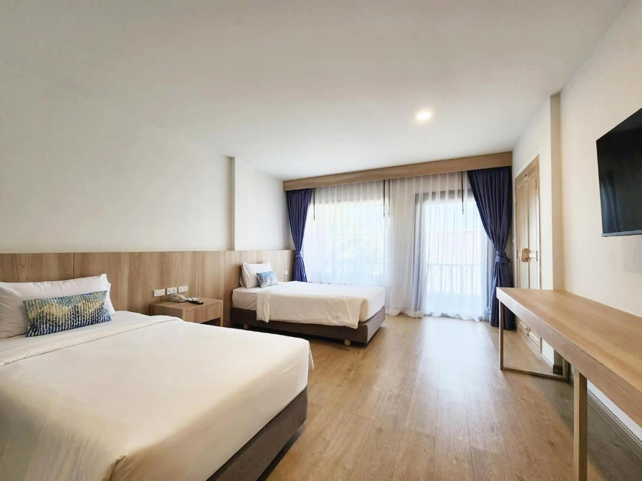 Bed in Namaka Resort Kamala