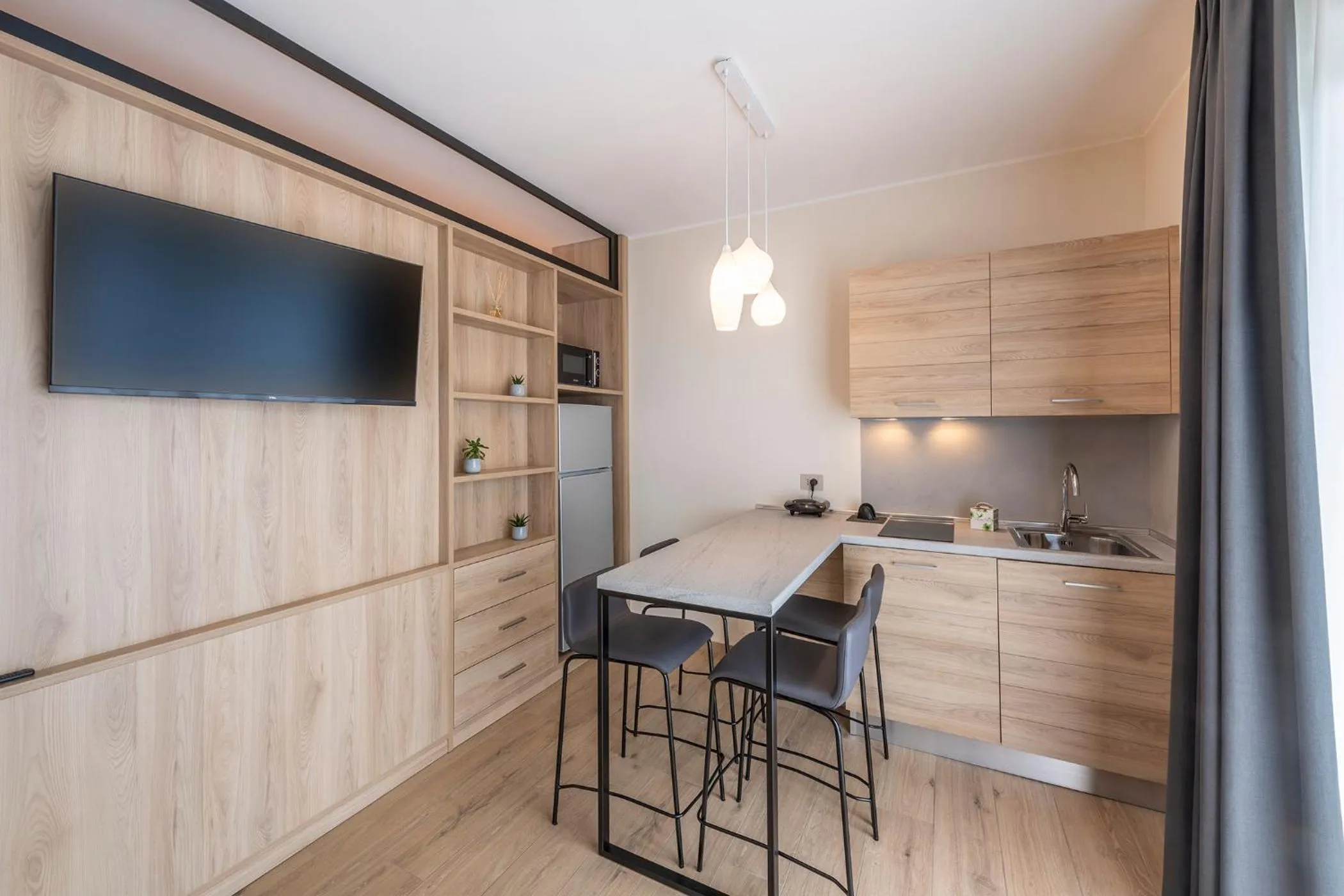 TV and multimedia in Evo Suites Apartments